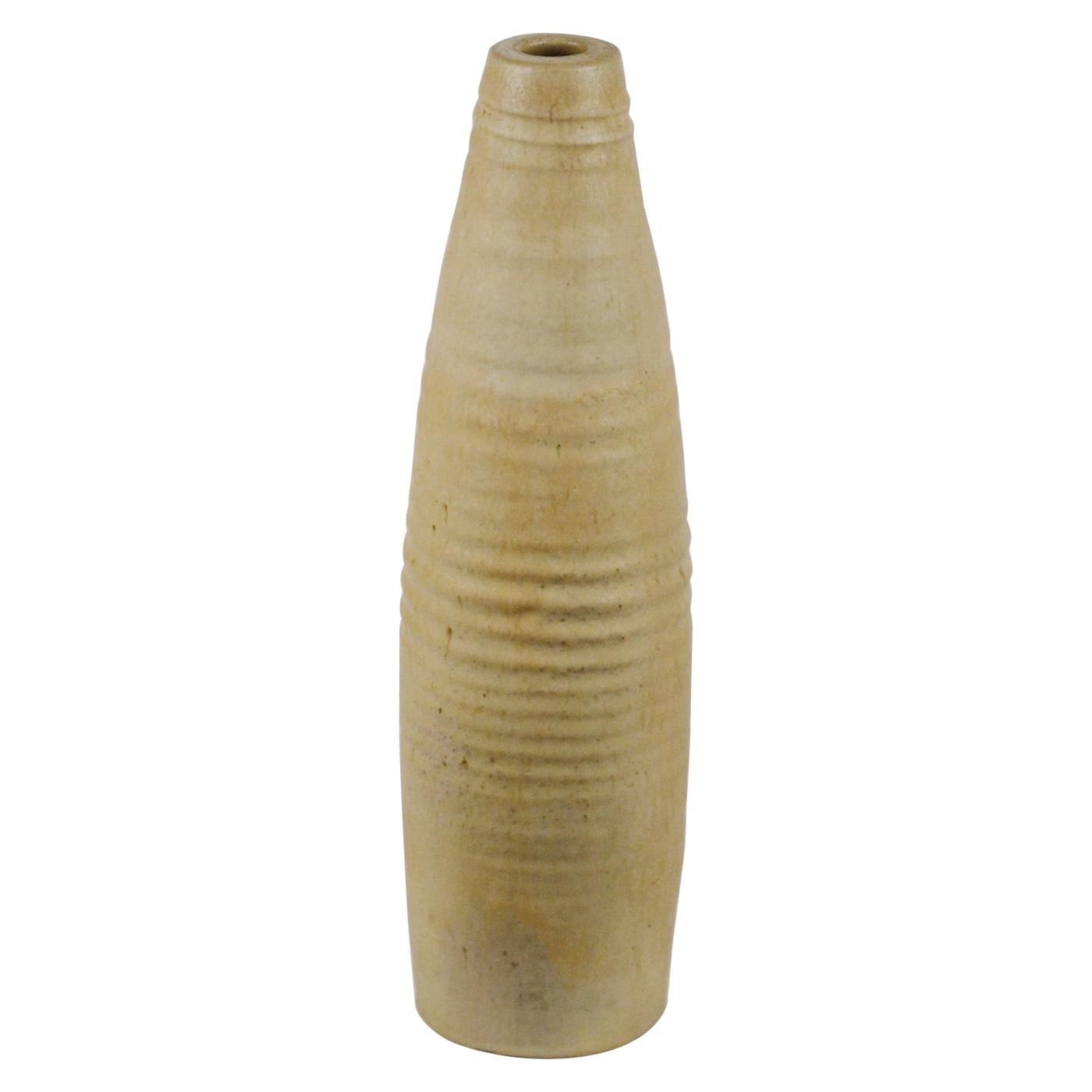 Hand turned studio pottery (floor) tall vase in elongated form has a natural finish. This all sculptural studio pottery vase created on the turning wheel by highly technical skilled Dutch ceramist in the 1960's. The semi matte glaze and form