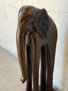 Tall Stylized Carved Dark Wood Elephant Statue on Black Base Vintage