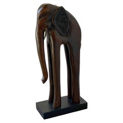 Tall Stylized Carved Dark Wood Elephant Statue on Black Base Vintage