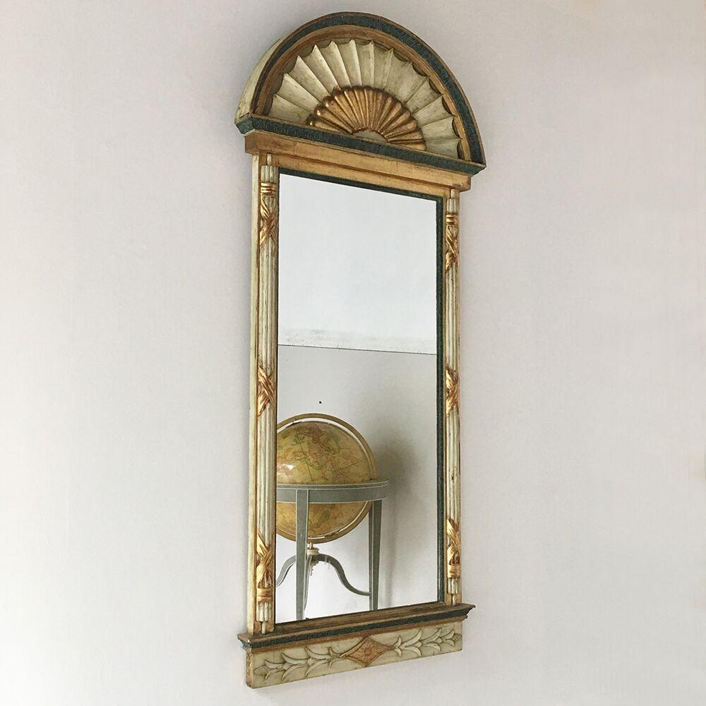 Wonderful tall Swedish Empire pier mirror dated circa 1820, retaining some original water gilding and paintwork. 
A gentle ivory paint wash shows through where the frame was oil gilded originally. The split mirror retains its original back boards