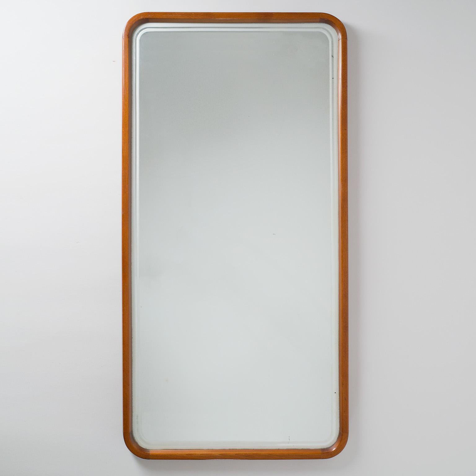 Tall Sedish mirror from the 1950s. Stained beech wood frame and original mirror with frosted decoration around the rim.