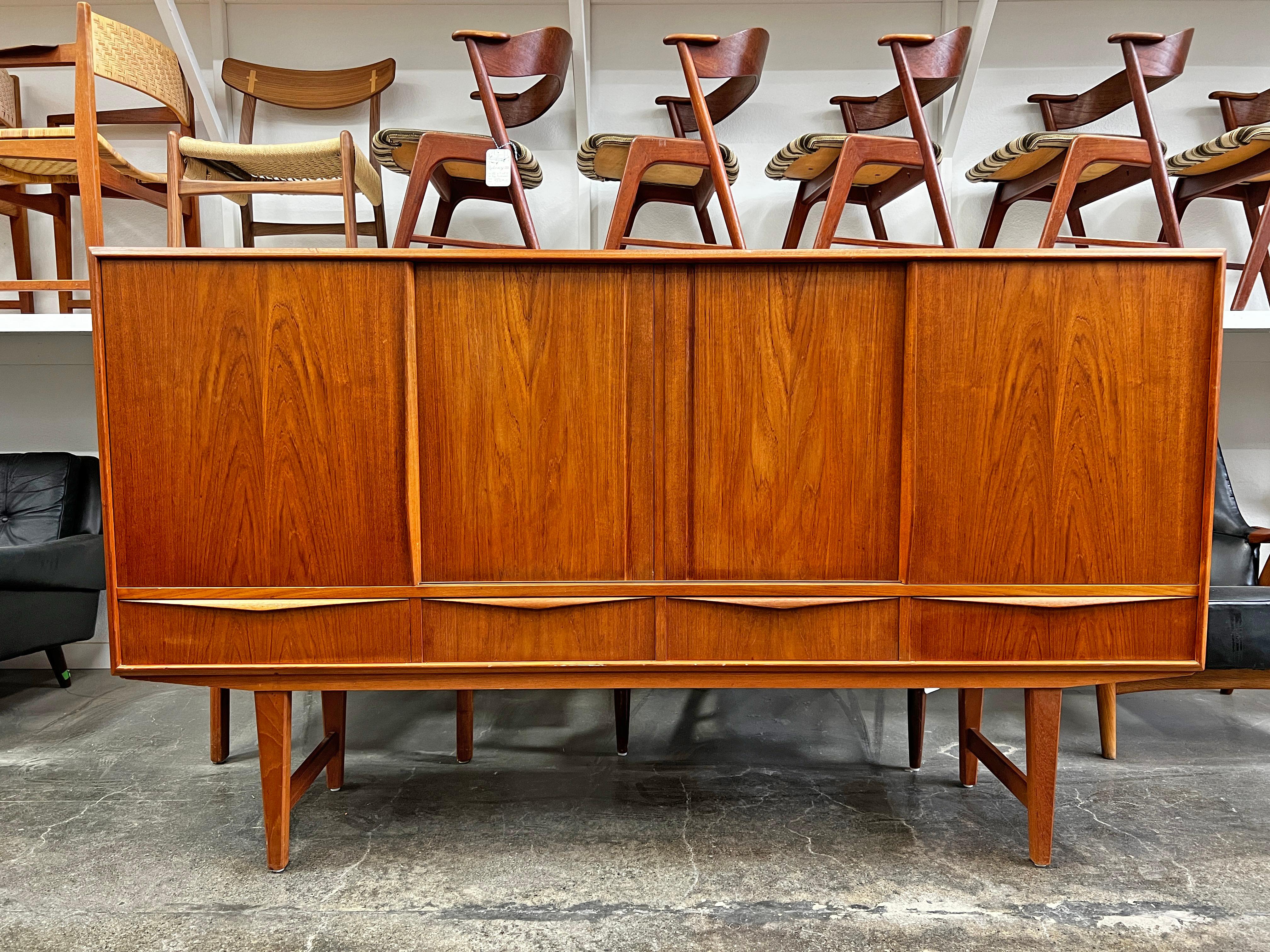 Mid-Century Modern Tall Teak Danish Modern Credenza by E.W. Bach with Bar For Sale