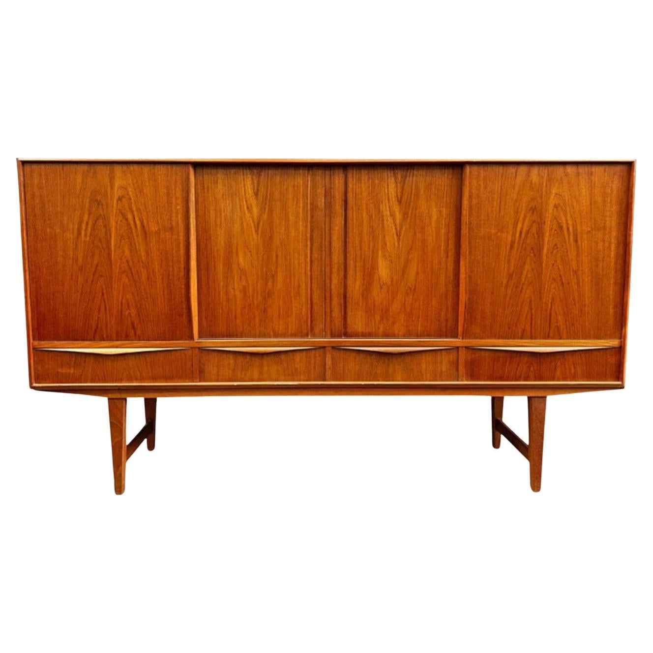 Tall Teak Danish Modern Credenza by E.W. Bach with Bar For Sale