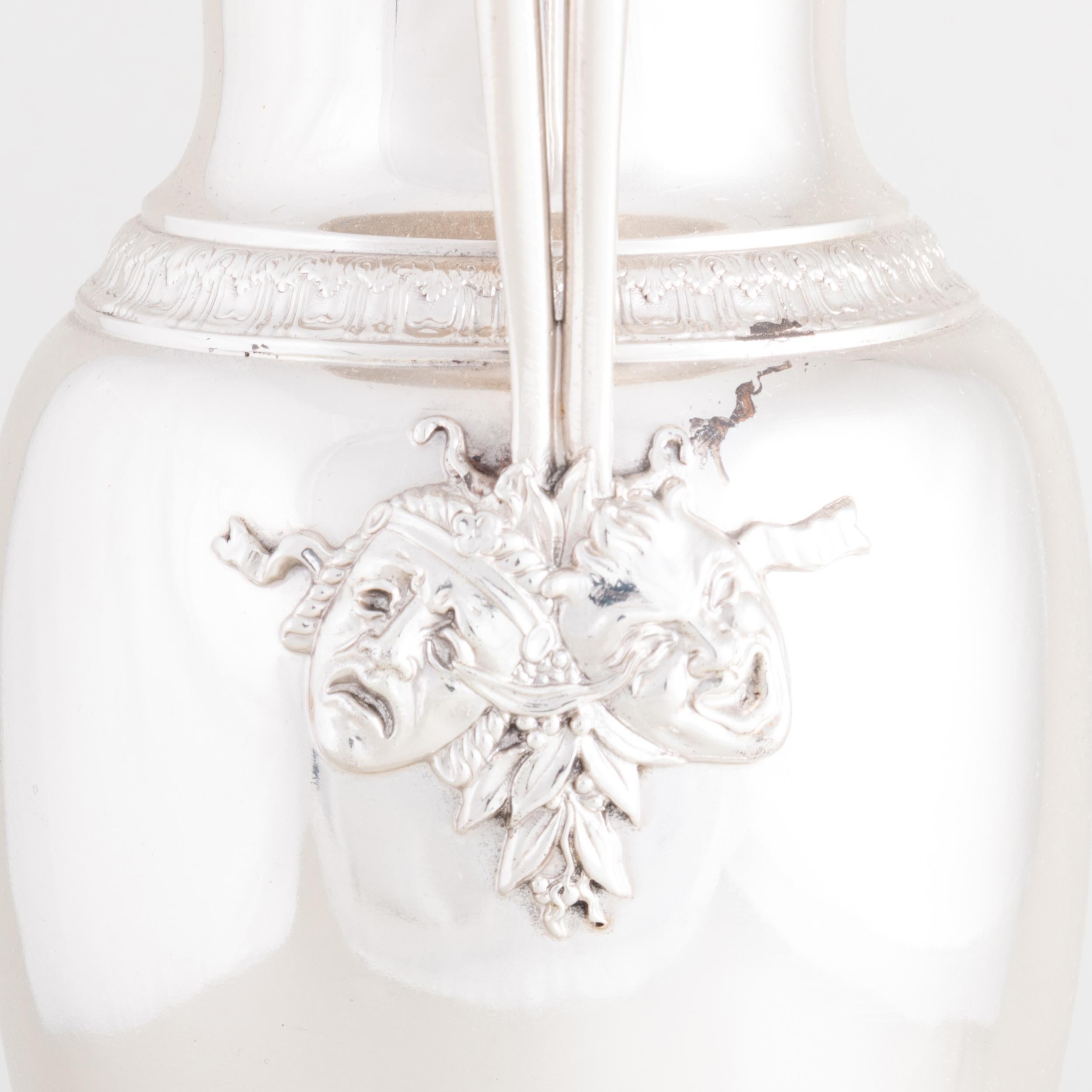 Introducing an exquisite Tall Tiffany & Co Sterling Silver Double Handled Decorative Vase. This remarkable piece boasts the renowned Tiffany & Co craftsmanship and showcases a truly captivating design. The vase features elegant double handles