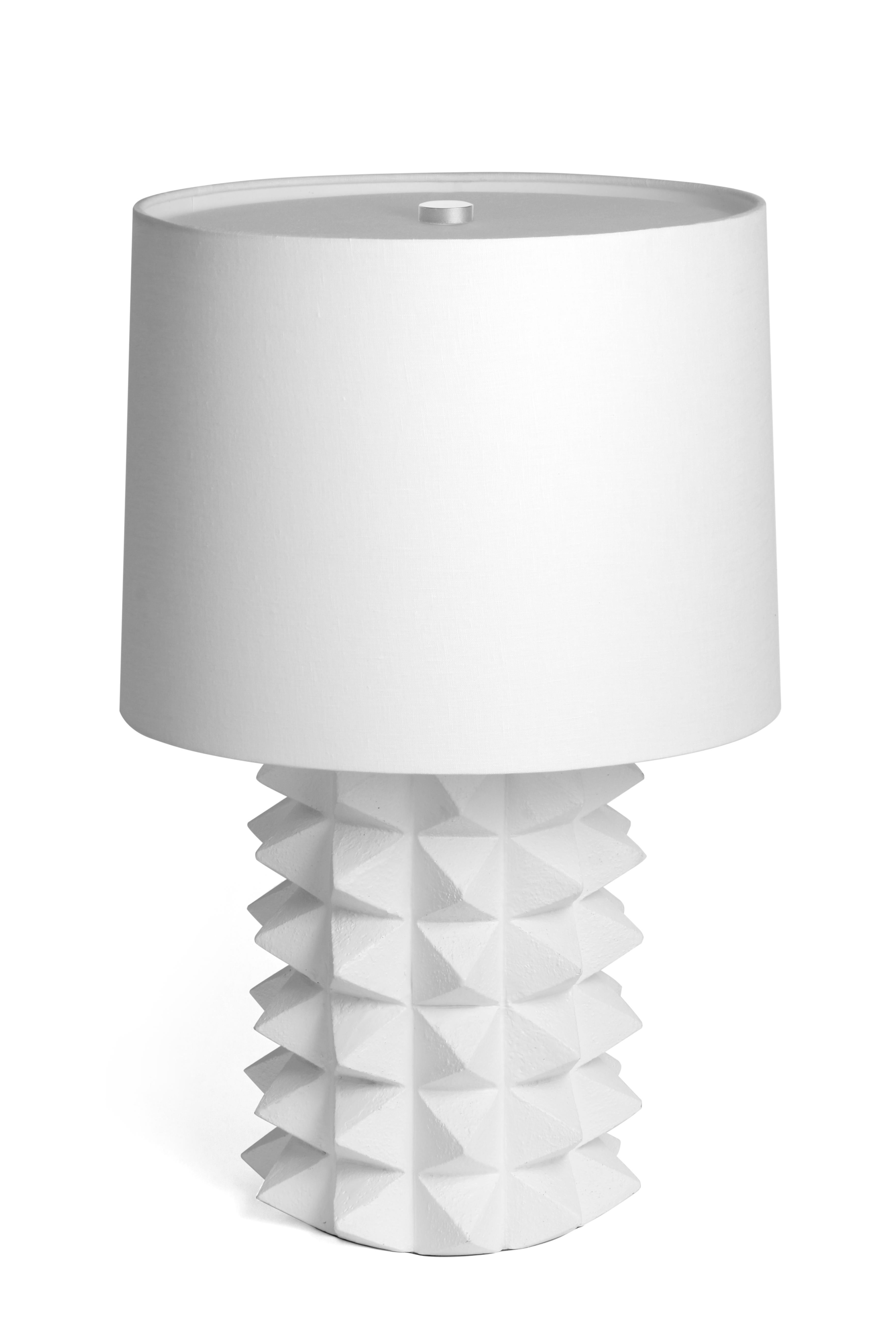 Illuminate your space with sophisticated radiance through our exceptional Toria Table Lamp, where artisanal craftsmanship meets contemporary luxury lighting design. The Toria Table Lamp embodies refined elegance with its perfectly balanced