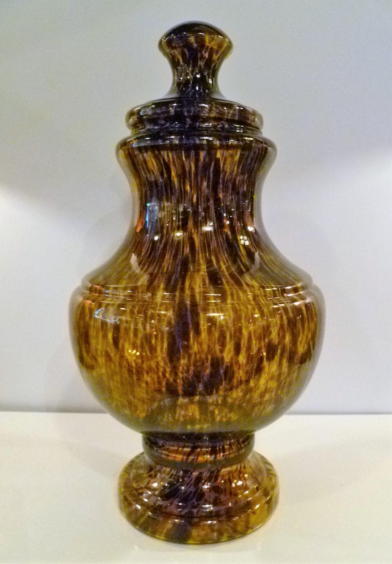 REDUCED FROM $950....Classic and elegant, very tall and large handmade Italian glass covered urn in a tortoiseshell design from late the 1960s and early 1970s, a period when modern decorative arts from Italy were in vogue.
The Tartaruga (tortoise)