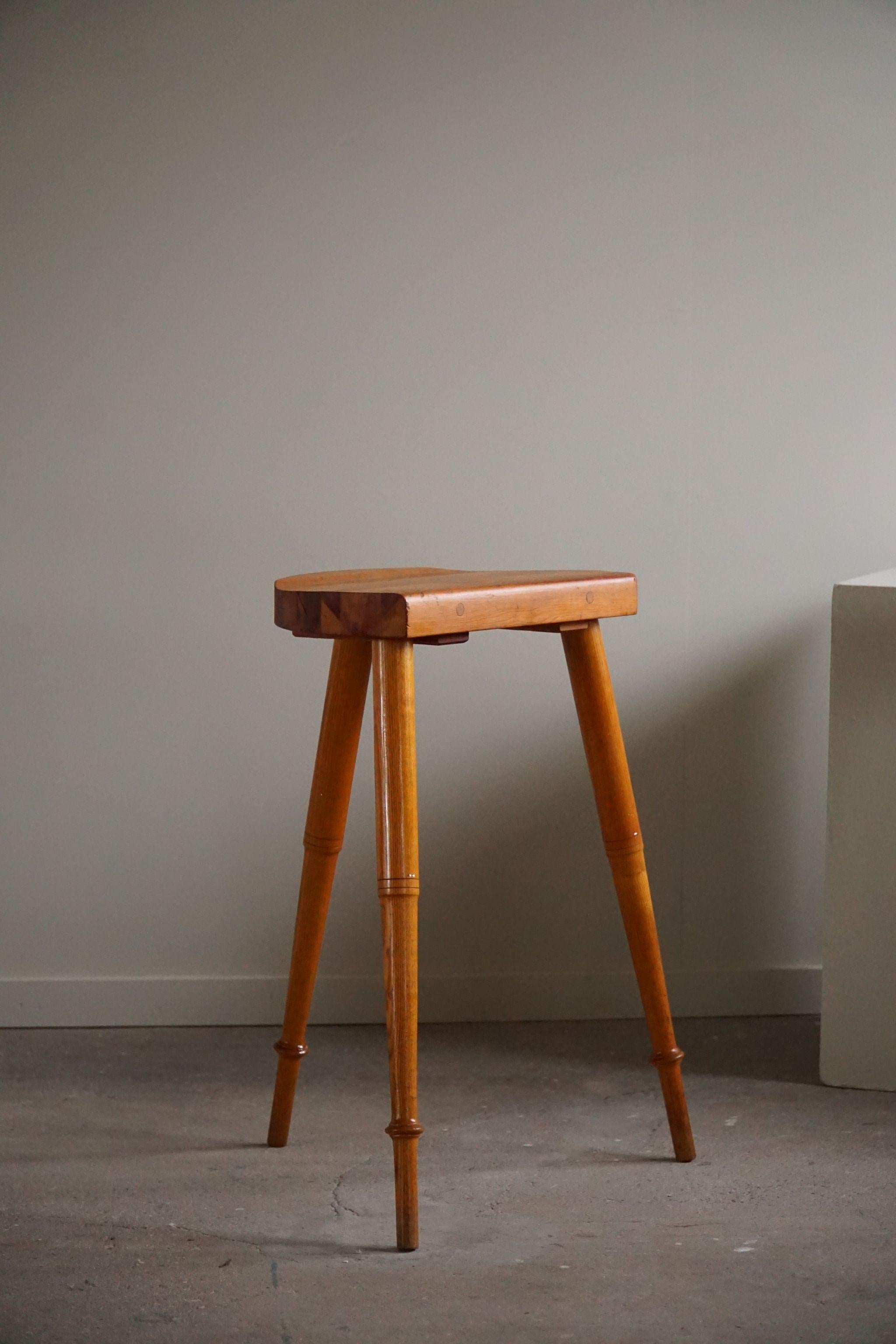 Highly decorative tall stool in solid pine. Made by a Danish cabinetmaker in 1960s. 

This modern stool will fit in many types of home decors. Perfectly suited for a Classic, Wabi Sabi, Scandinavian or an Art Deco interior style.

A great