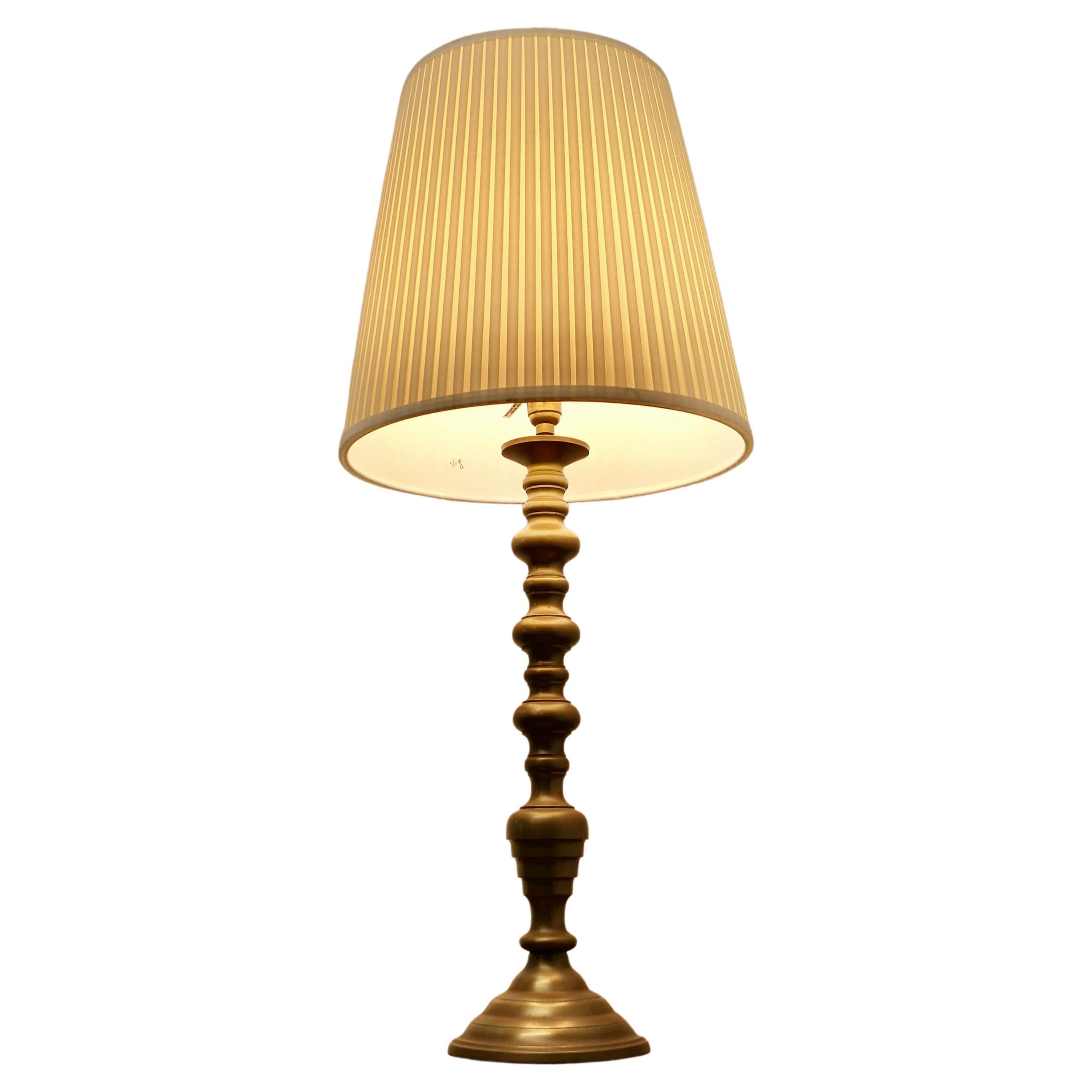 Tall Turned Brass Table Lamp   This is a good quality brass piece  For Sale