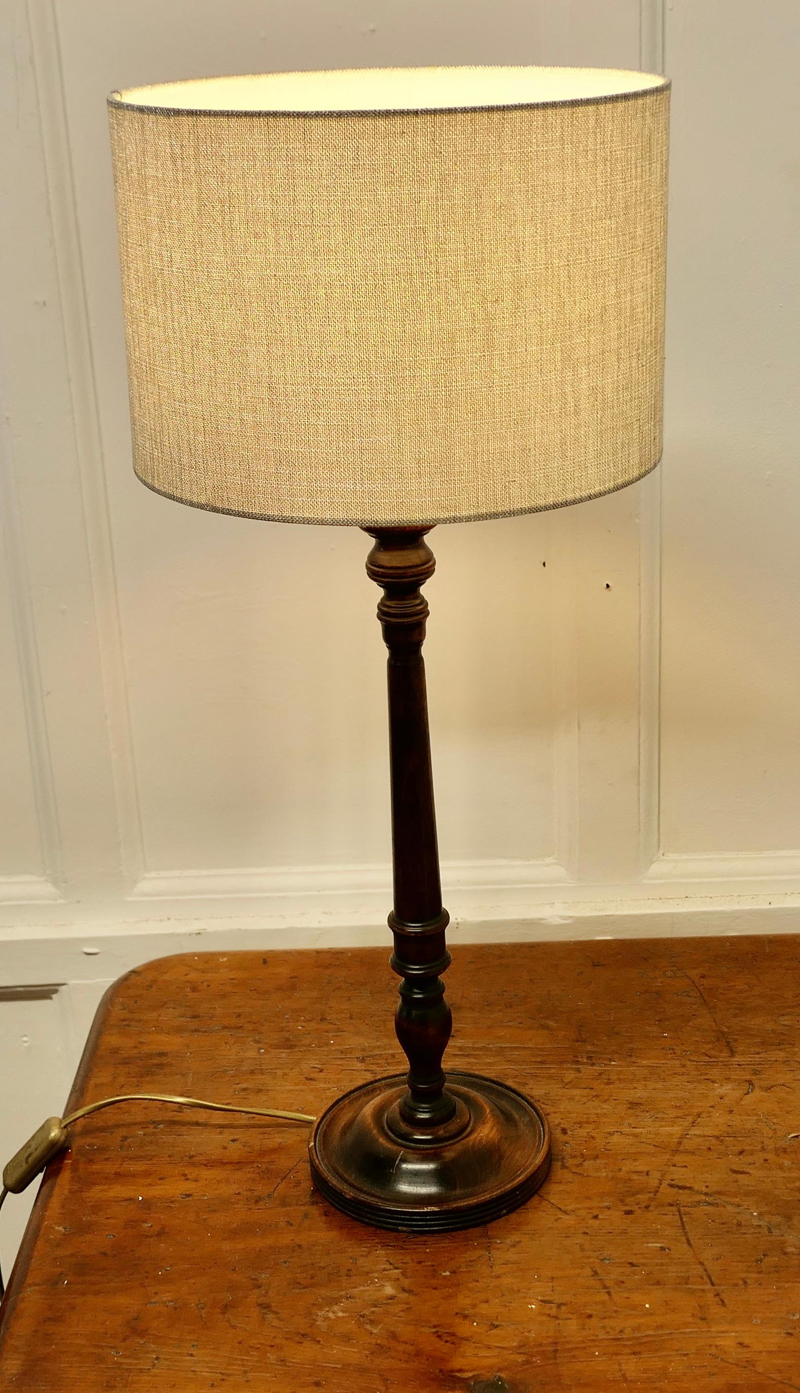 Early 20th Century Tall Turned Dark Wood Table Lamp    For Sale