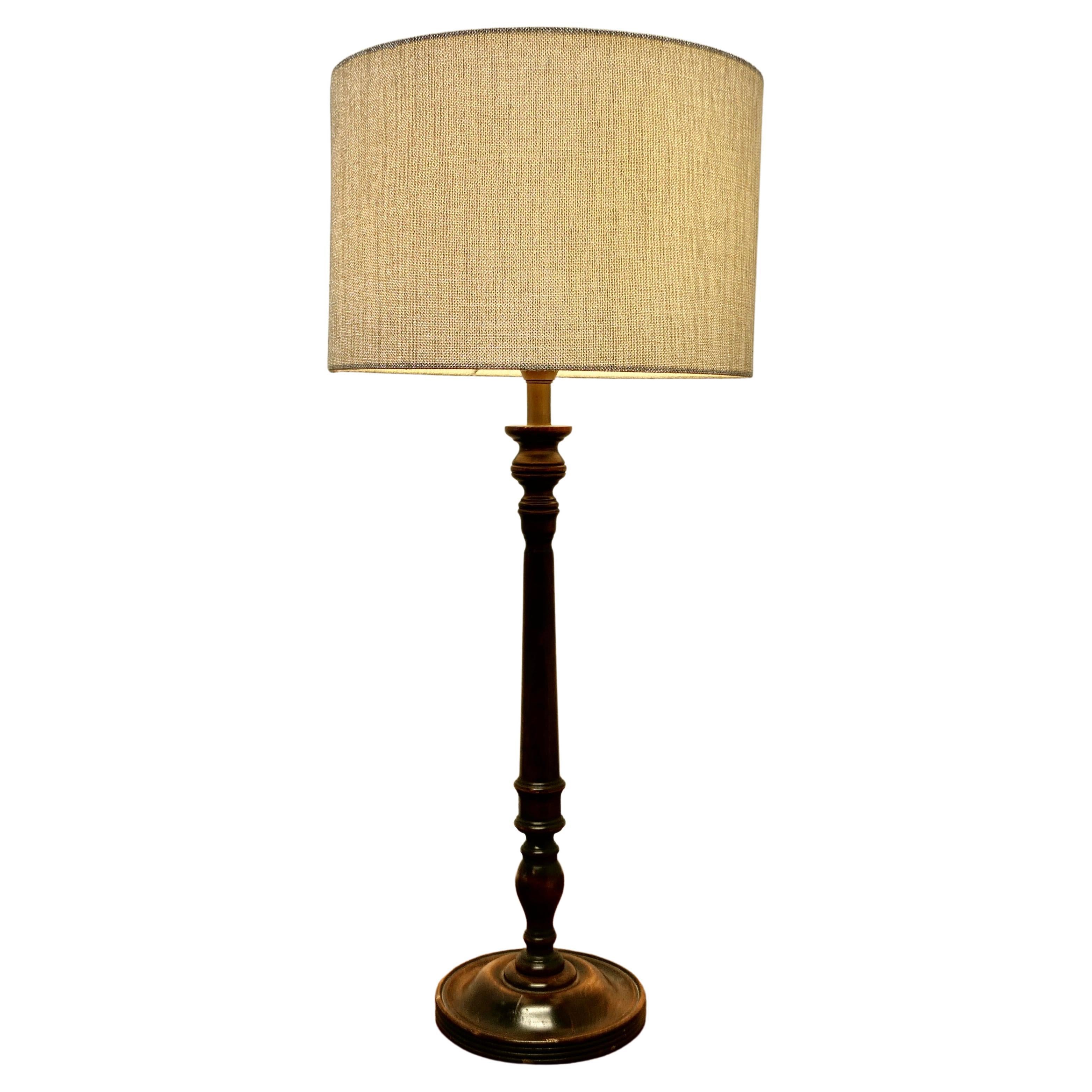 Tall Turned Dark Wood Table Lamp    For Sale