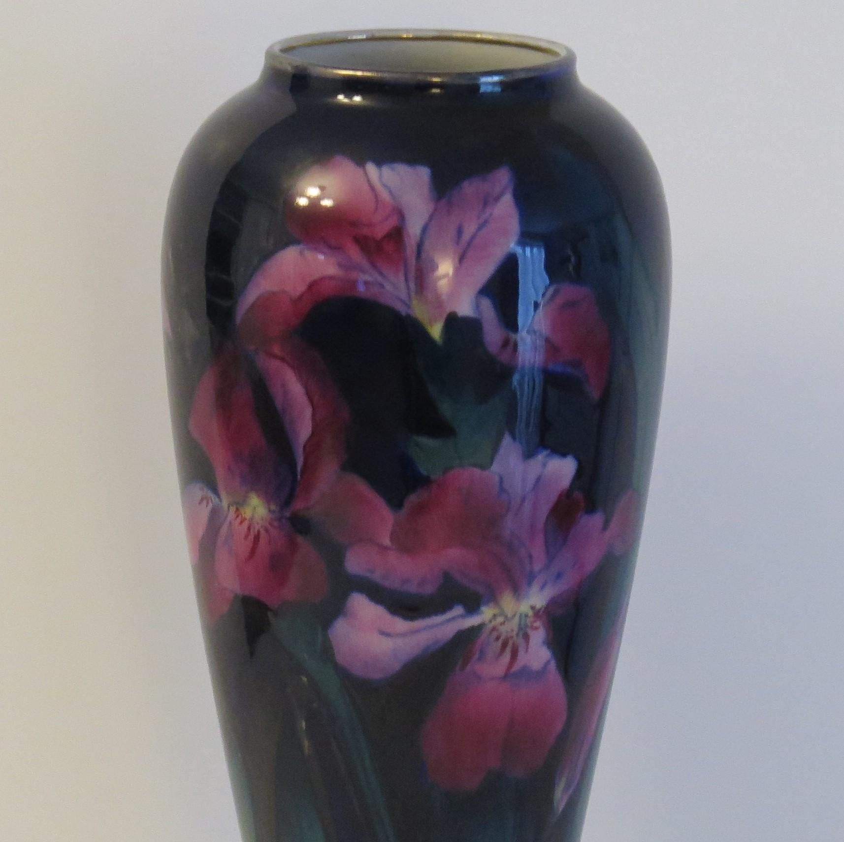 This is a tall beautifully decorated Vase by George Jones & Sons, of Trent Pottery, Staffordshire, dating to the late 19th Century.

This vase is well potted vase with a tall baluster shape and open neck.

This piece is beautifully decorated in