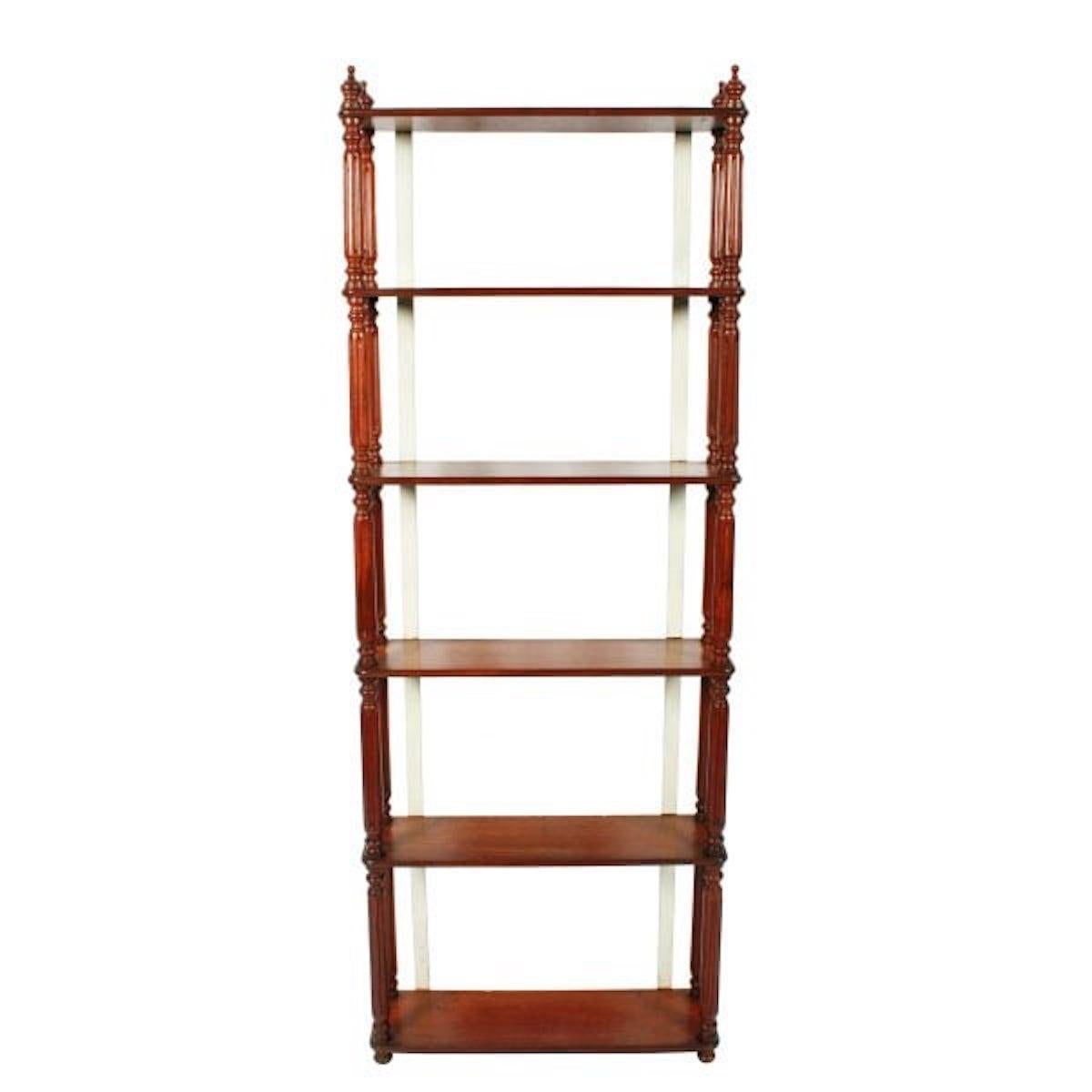 Tall Victorian wall shelves

A set of tall 19th century Victorian mahogany wall hanging shelves.

The six oblong shelves have half round moulded edges and turned and fluted pillar supports, the top and bottom shelves have decorative turned