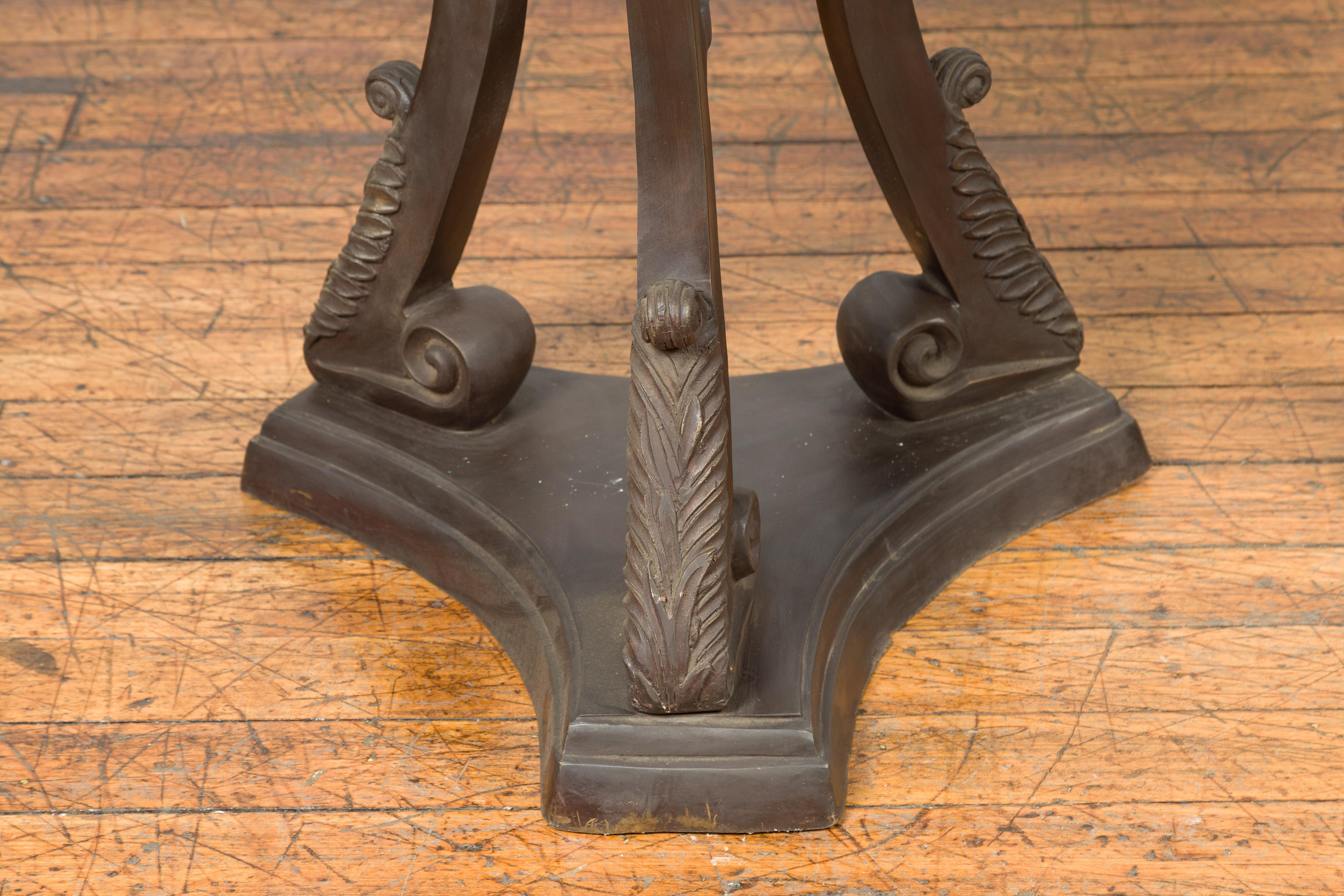 Tall Vintage Bronze European Style Tripod Planter with Raised Floral Motifs In Good Condition For Sale In Yonkers, NY