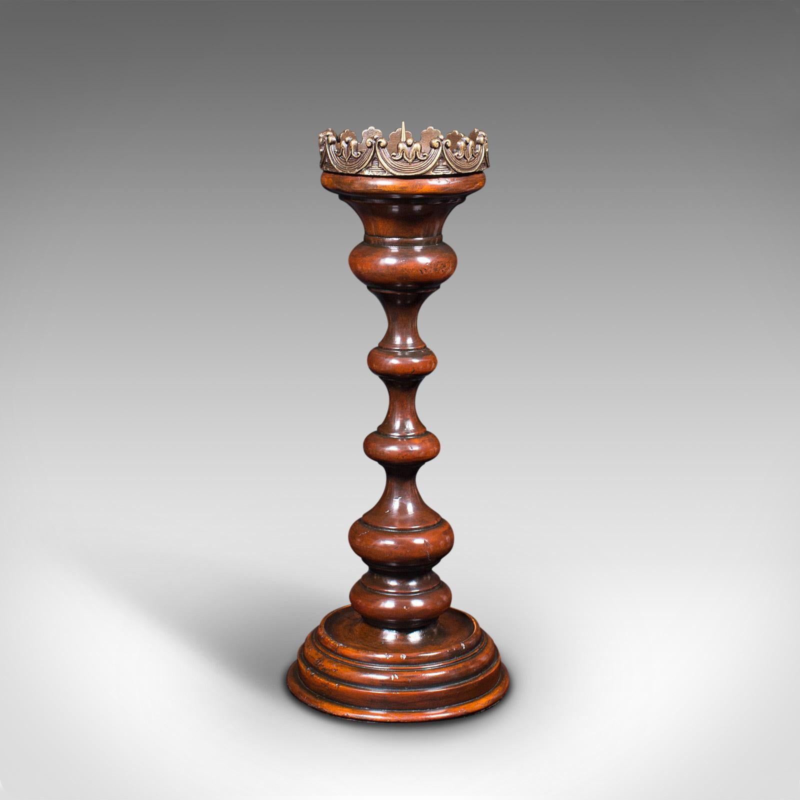 This is a tall vintage centrepiece torchere. A French, beech candlestick with ecclesiastical taste, dating to the mid 20th century, circa 1960.

Skilfully turned torchere for illuminating intimate gatherings
Displays a desirable aged patina and