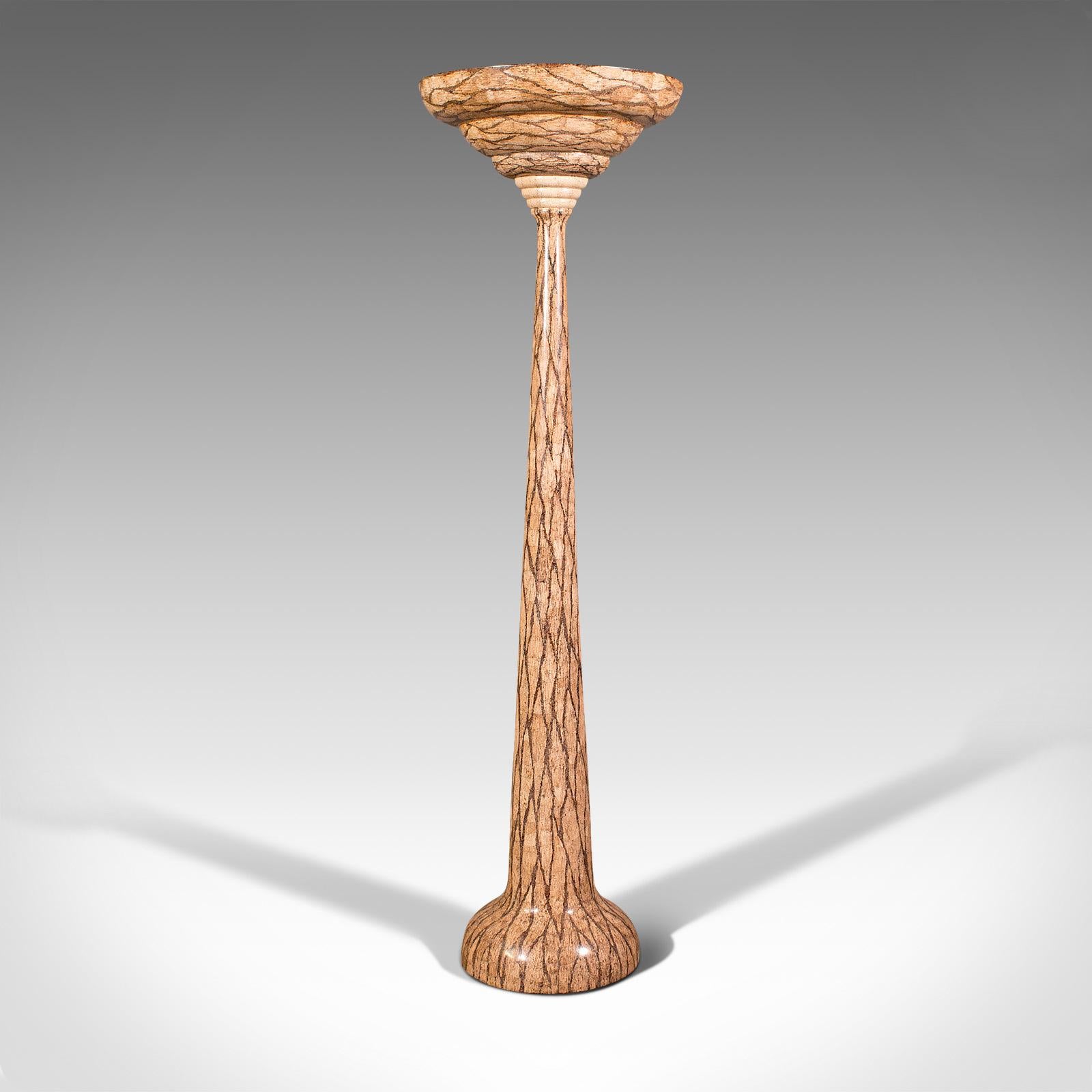 This is a tall vintage decorative torchere. An Italian, composite jardiniere or planter, dating to the late 20th century, circa 1970.

Striking finish and grand proportion
Displays a desirable aged patina throughout
Decorated composite form