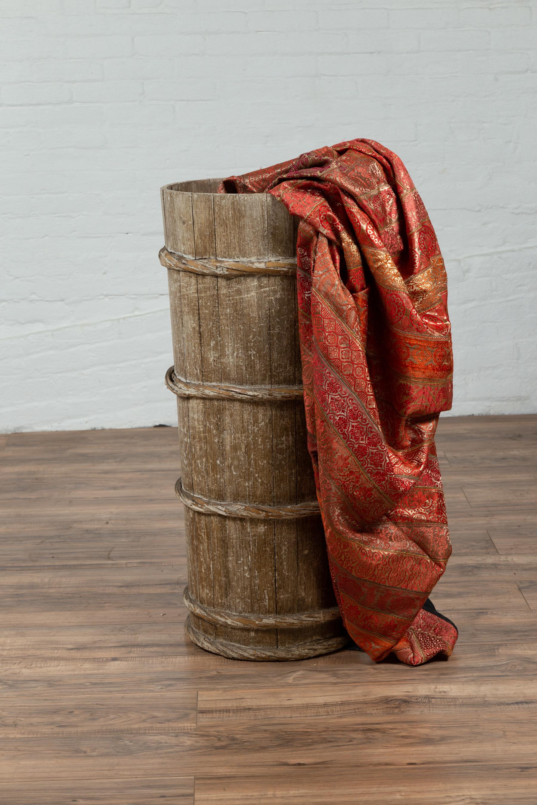 Thai Tall Vintage Rustic Wooden Barrel with Slatted Body and Rope-Style Motifs For Sale