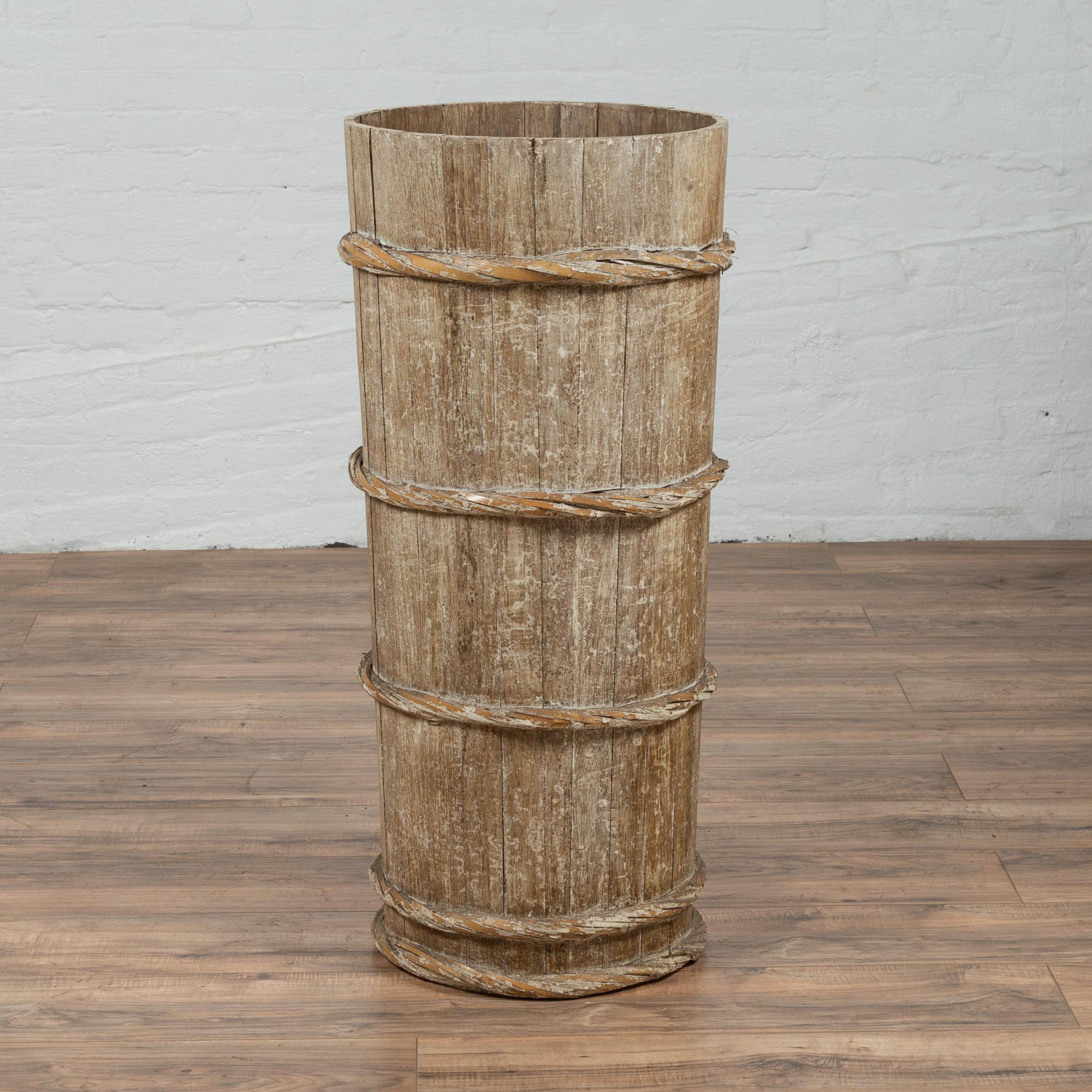 Tall Vintage Rustic Wooden Barrel with Slatted Body and Rope-Style Motifs In Good Condition For Sale In Yonkers, NY