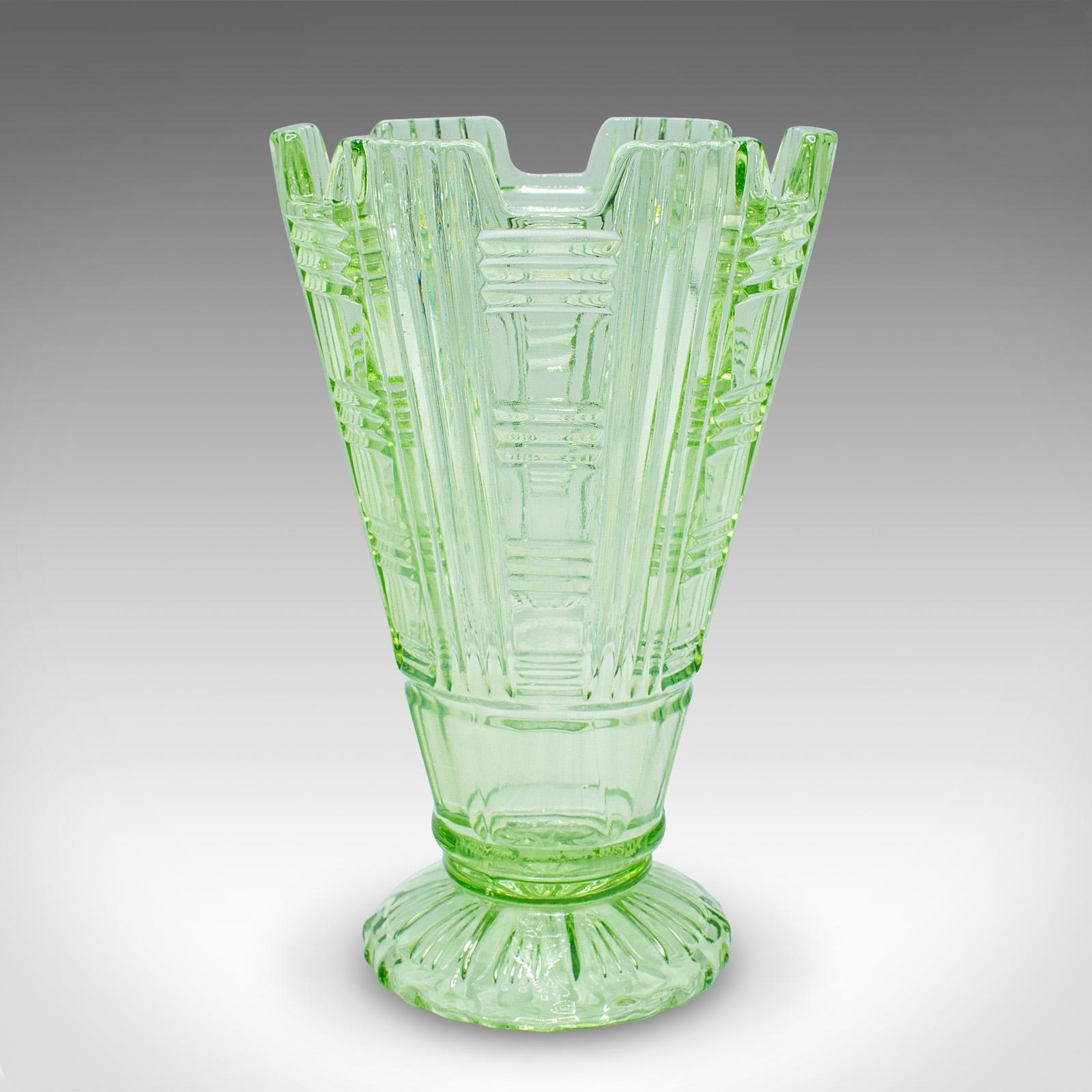 
This is a vintage sharing sundae cup. An English, art glass dessert server, dating to the early 20th century, circa 1930.

Appealing dessert glass with eye-catching form and colour
Displays a desirable aged patina and in good order
Green coloured