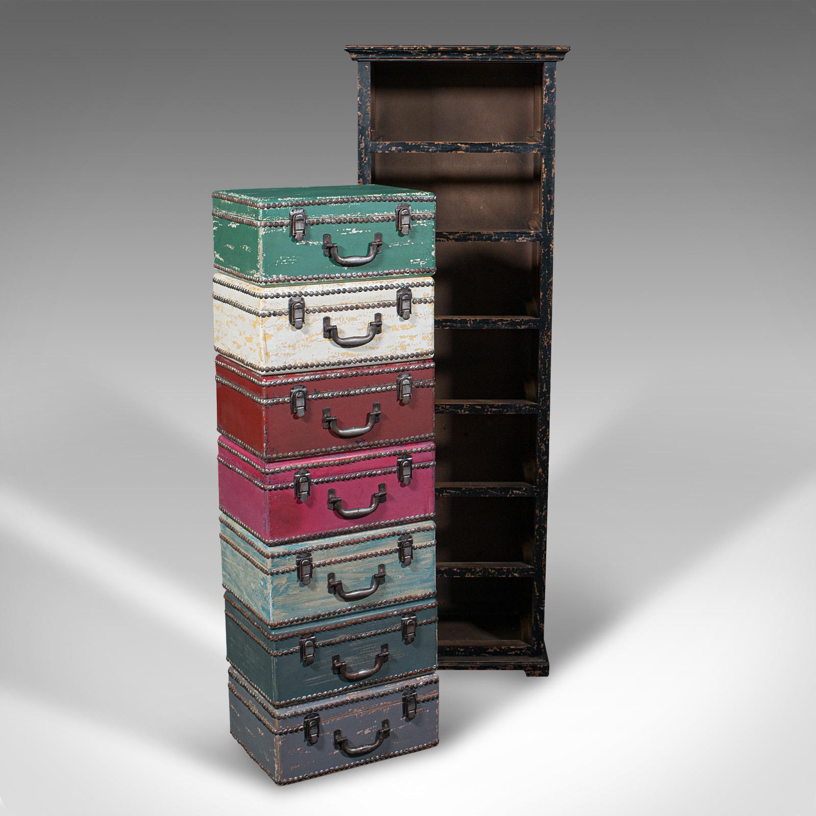 This is a tall vintage trunk stand. An English, hand-painted pine suitcase chest of drawers, dating to the late 20th century, circa 1980.

Full of character and a practical storage solution
Displays a desirable aged patina