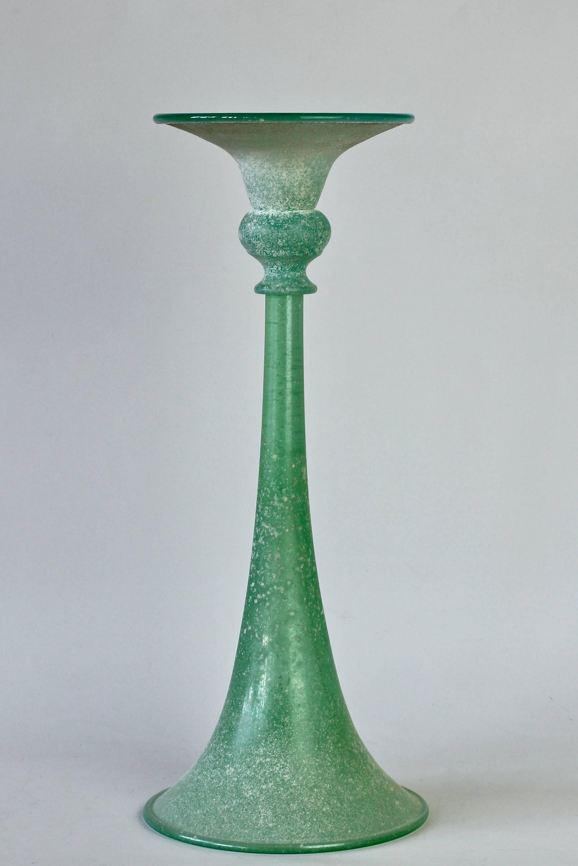 Tall fluted green 'a Scavo' glass vase or candlestick holder attributed to Seguso Vetri d'Arte Murano, Italy. Elegant in form and showing extraordinary craftmanship with the use of the 'Scavo' technique - a technique of rolling the glass, whilst in