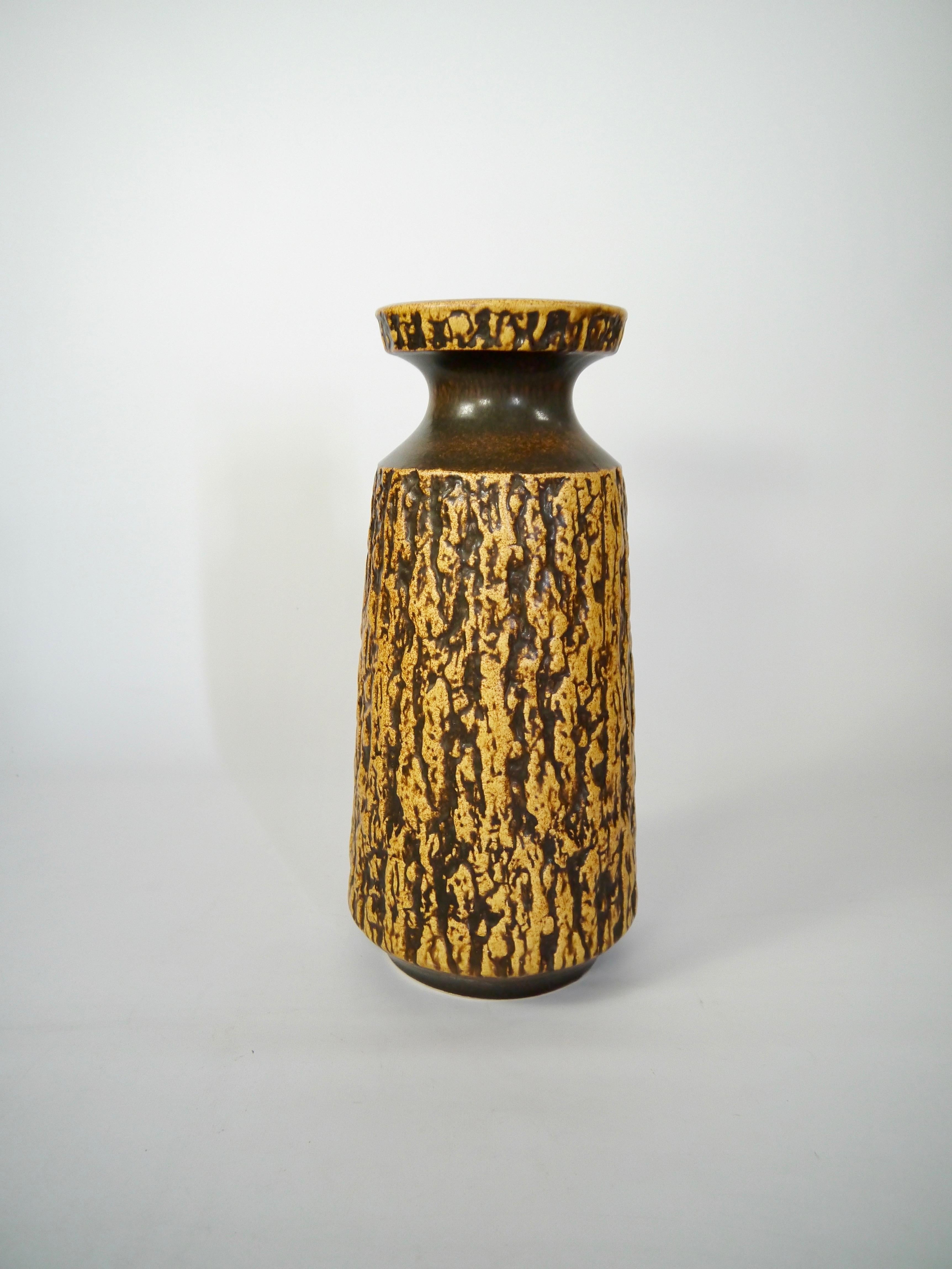 Tall fat lava floor vase produced by Jasba in the 1960s. Organic shape pattern, mimicking pine tree bark. Color and pattern very wabi-sabi.