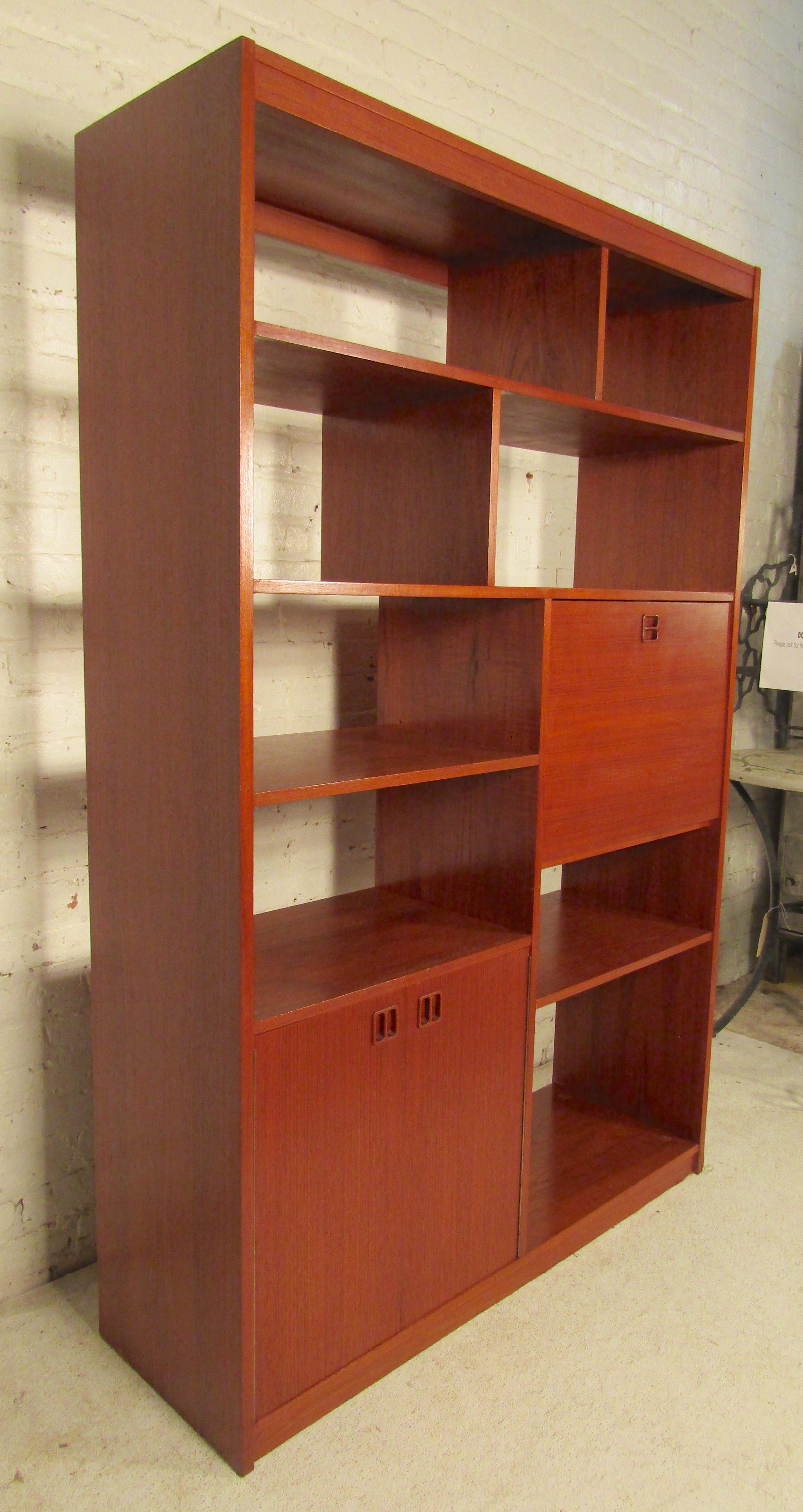 Mid-Century Modern teak grain room divider with storage. 
(Please confirm item location - NY or NJ - with dealer).
     