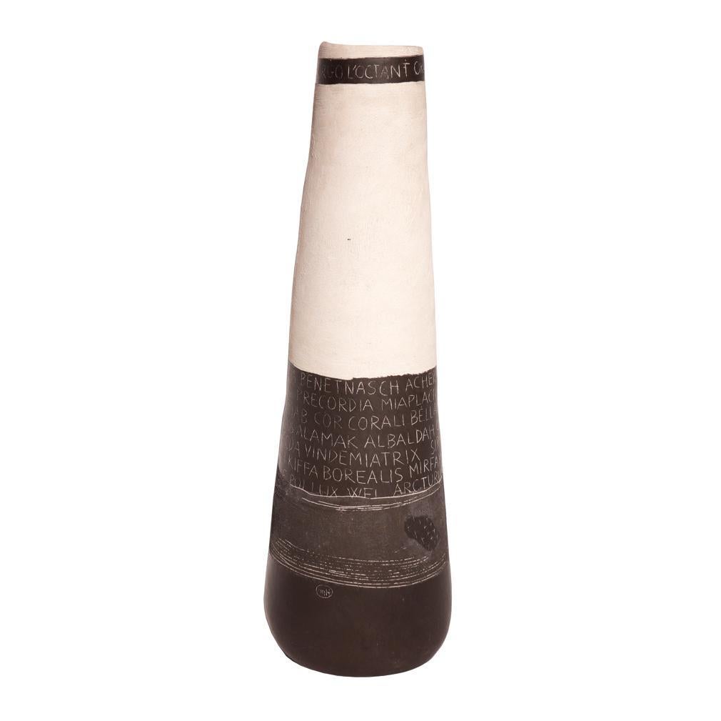 Italian studio ceramic, a large hand-built raku fired, tapered cylinder vase in cream and brown colors, narrow at the top to wide at the base. The incised script that runs around two of the bands features the scientific names of stars from all the