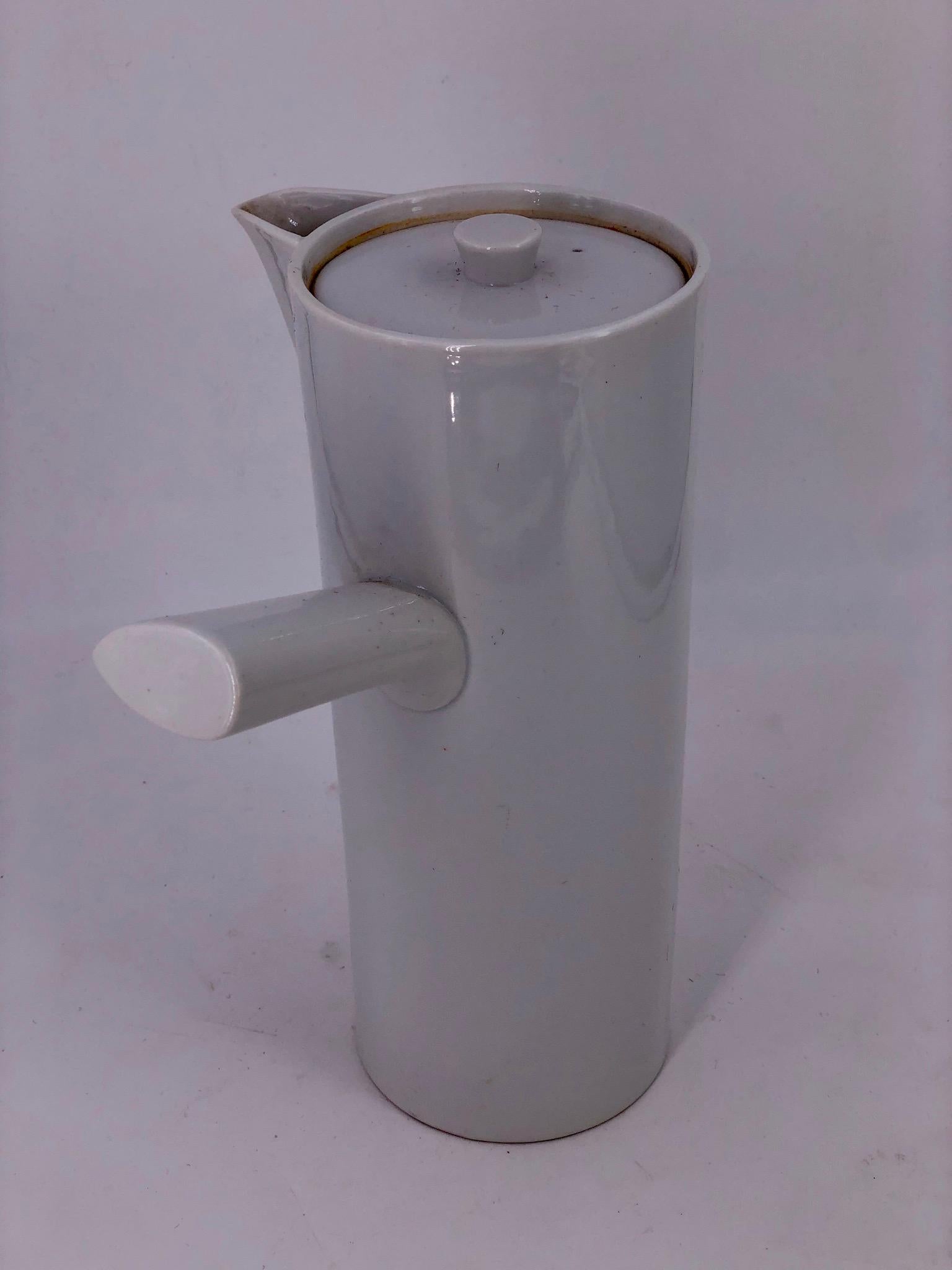 tall white ceramic pitcher