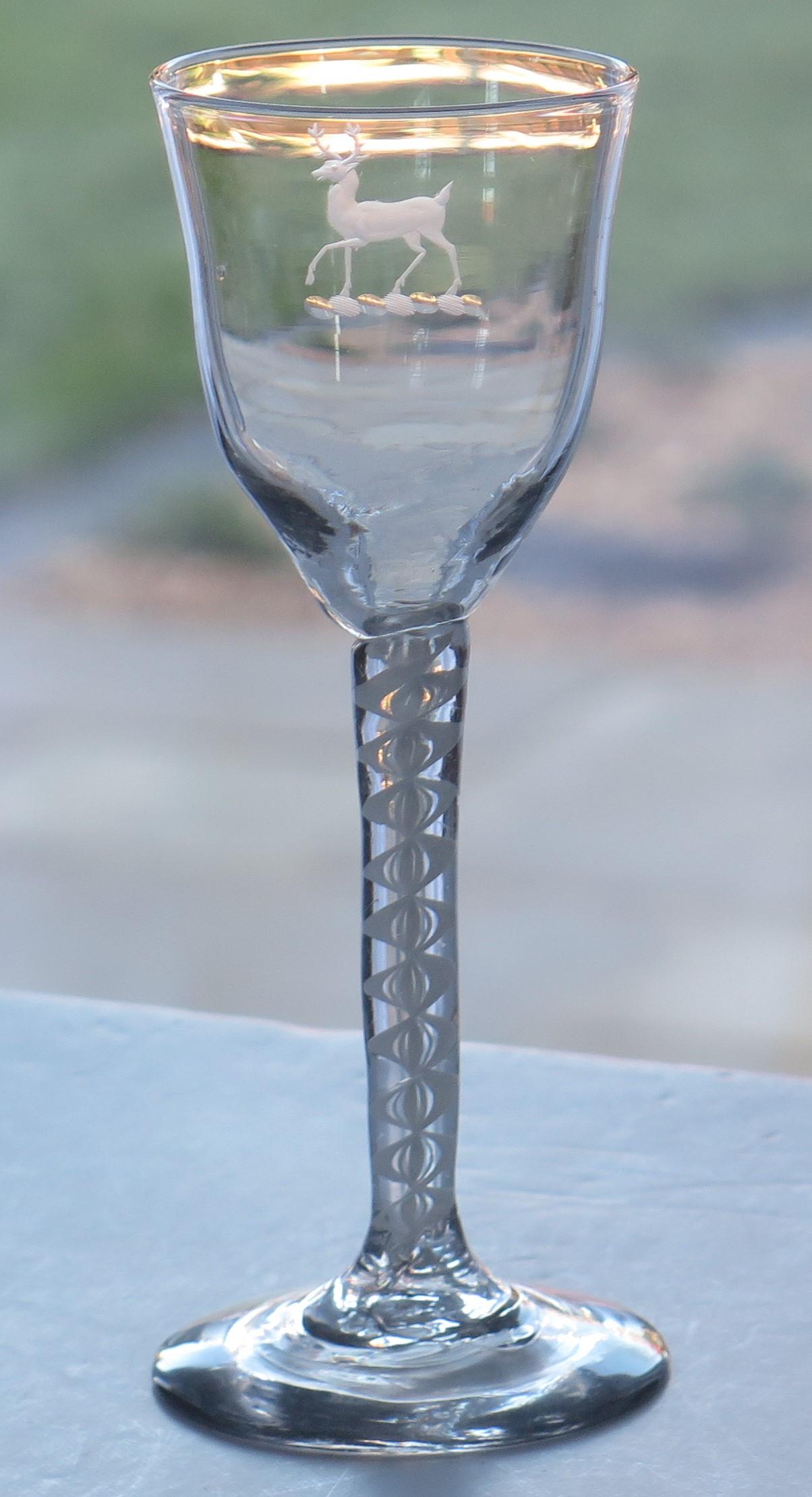 This is a very good hand-blown, English, mid-Georgian, Wine drinking glass with a double series, cotton or opaque twist (DSOT) stem, dating from the middle of the 18th century, circa 1760.

These glasses are very collectable. It is made from