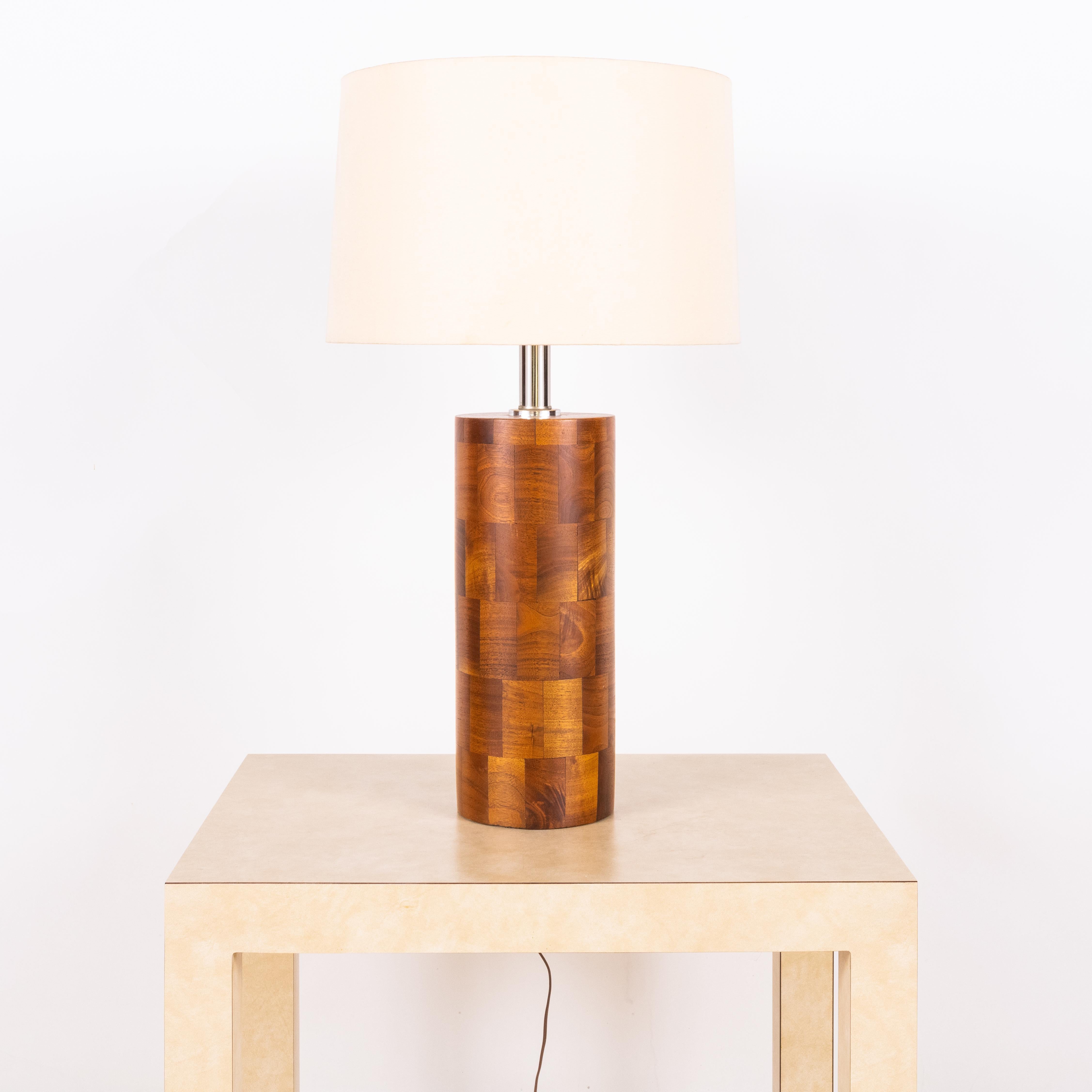 Tall wood block column lamp with linen shade by Amter Craft.

Dimensions listed (16 in. diameter x 29 in. tall) are the overall dimensions of the lamp with the shade, with the base 19 in. tall and the shade 10 in. tall.