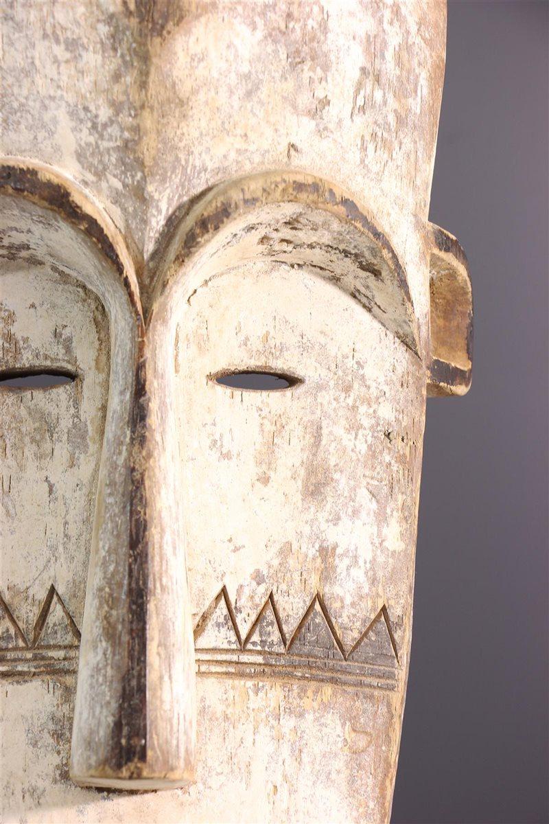 Late 20th Century Tall Wooden Tribal Fang Mask of Ngil Brown, Creme and Red Colored Gabon 1970s For Sale