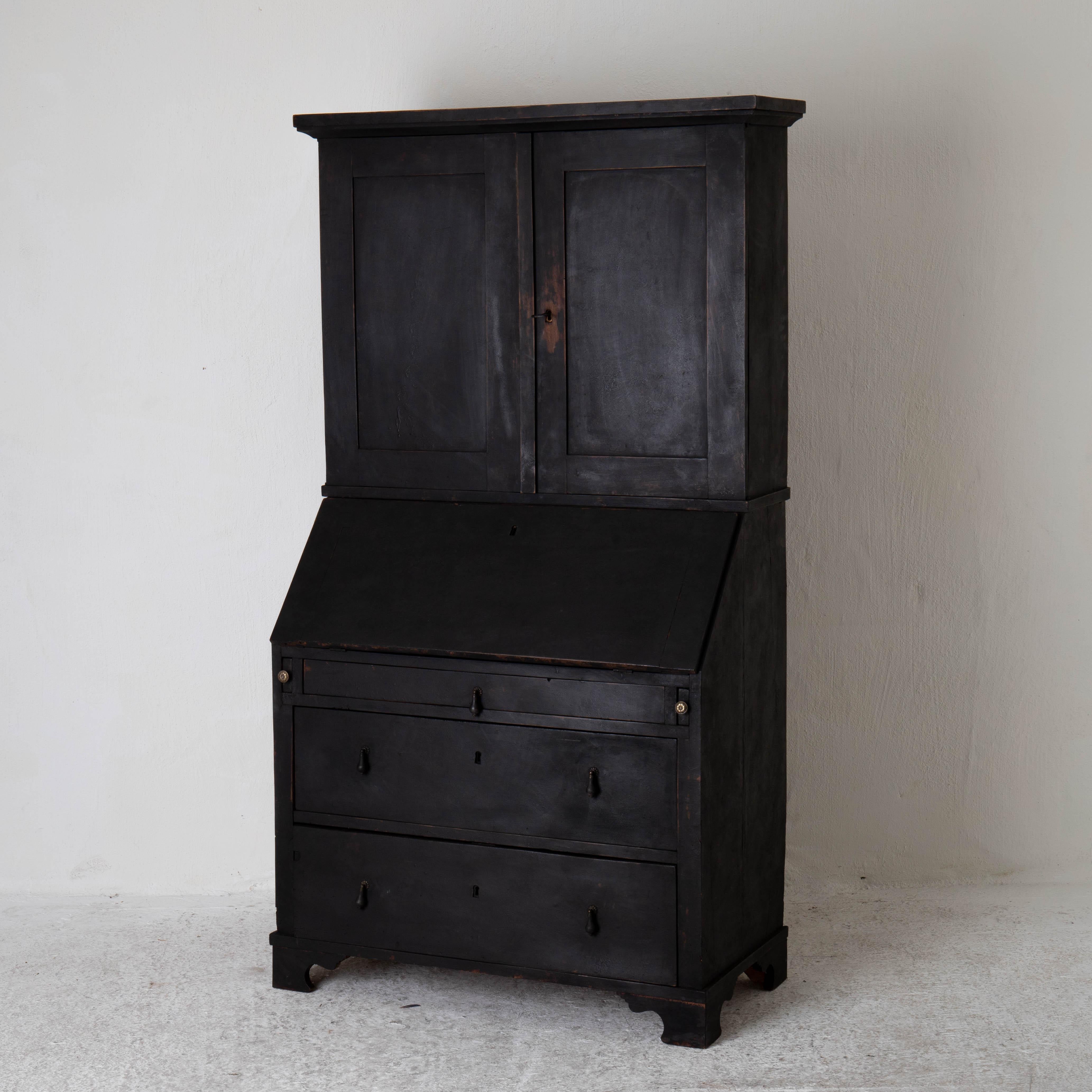 Tall writing desk secretary Swedish Black 19th Century Sweden. A writing desk made during the 19th Century in Sweden. Painted in our signature paint Laserow Black. Contemporary hardware. Shelving and interior with drawers and compartments.