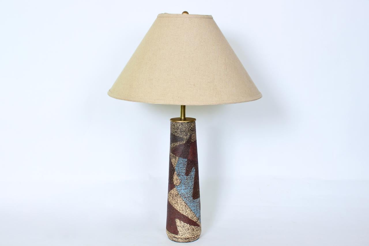 Dutch Organic Modernist Zaalberg Pottery Art Pottery Table Lamp, Circa 1950. Featuring a tapered textured form accentuated with overlapping organic shapes and forms, glazed in Dark Brown, Brown, Blue (Pantone 284), and Cream Beige. Brass plated neck