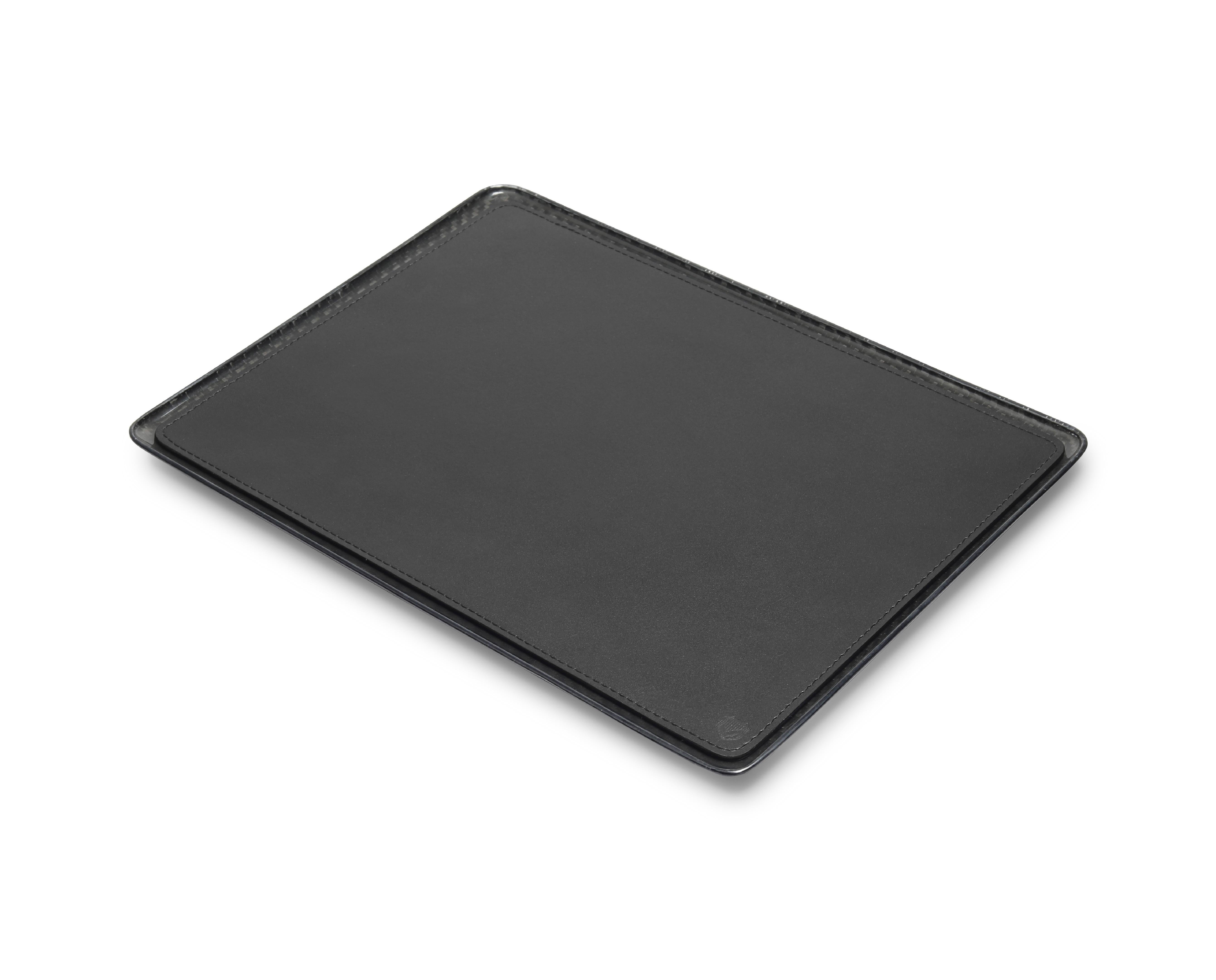 Talon A4 desk tray by Madheke
Dimensions: D 25 x W 33.7 x H 1.5 cm.
Materials: Leather, carbon fiber.

A desk should not be a place of disarray and clutter, with the TALON A4 Tray it won't be. All essential correspondence can be placed neatly in