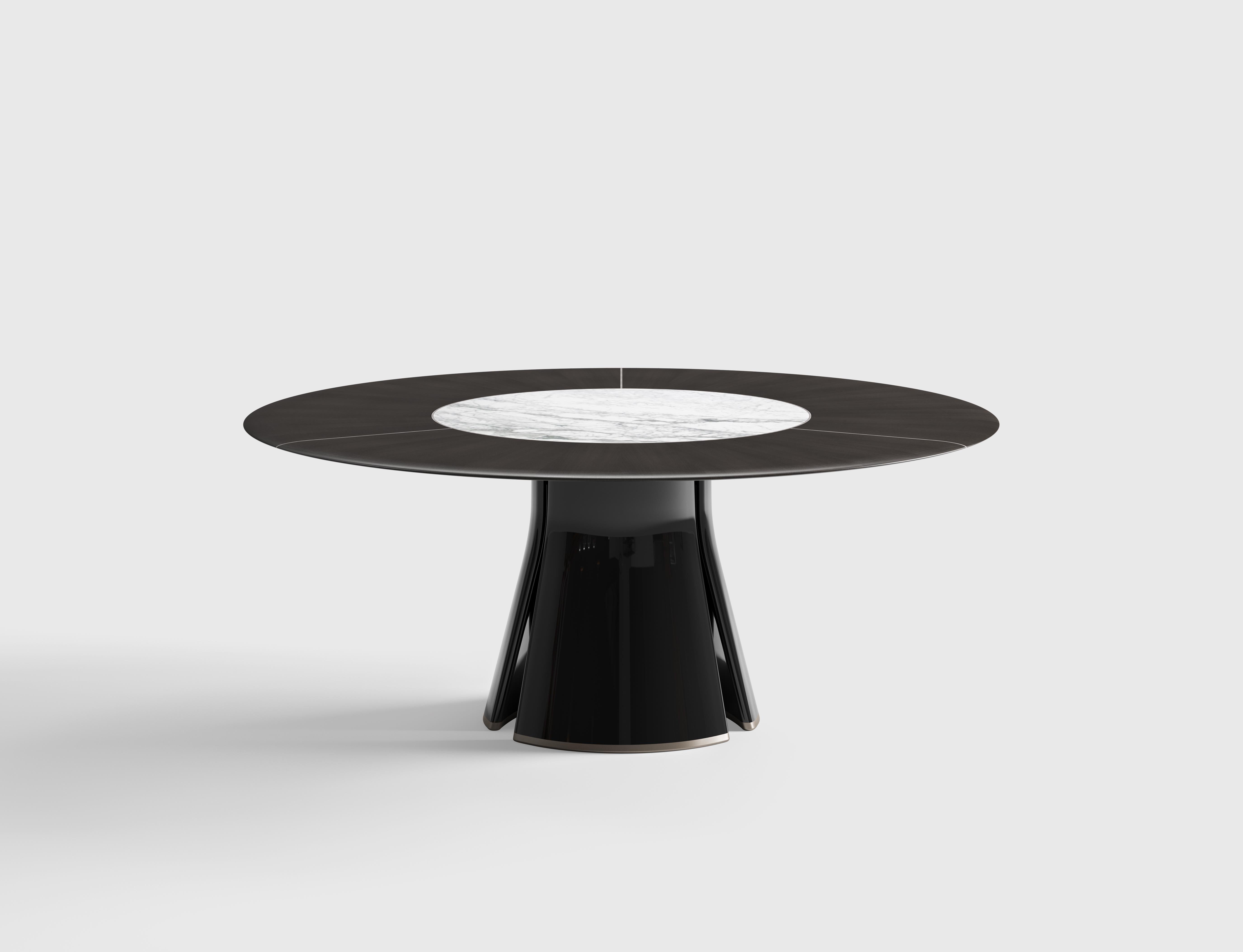 Il s'agit d'une table de salle à manger ronde élégante, conçue à la fois pour l'élégance et la fonctionnalité. Le plateau de la table peut être fabriqué en marbre ou en bois, offrant une esthétique luxueuse ou chaleureuse selon le matériau choisi.