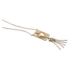 Tama Pendant with Love Burning Sacred Heart in 14kt Yellow Gold with Tassel
