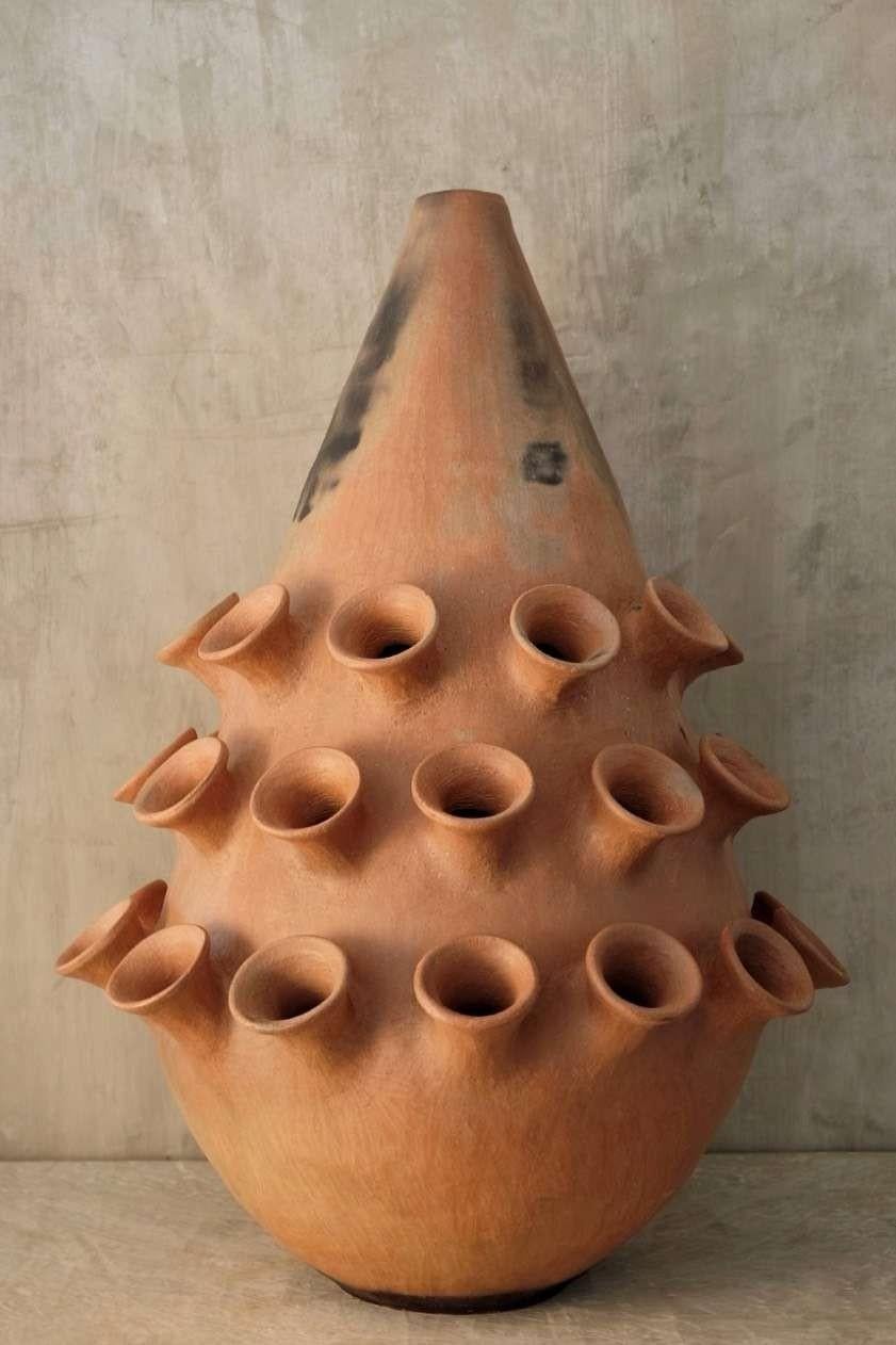 Tama three lines vase by Onora
Dimensions: D 60 x H 80 cm
Materials: Clay

Inspired in the traditional large format vessels used to store water, grains or prepare food, our playful reinterpretation of Mixe pottery plays homage to this region’s