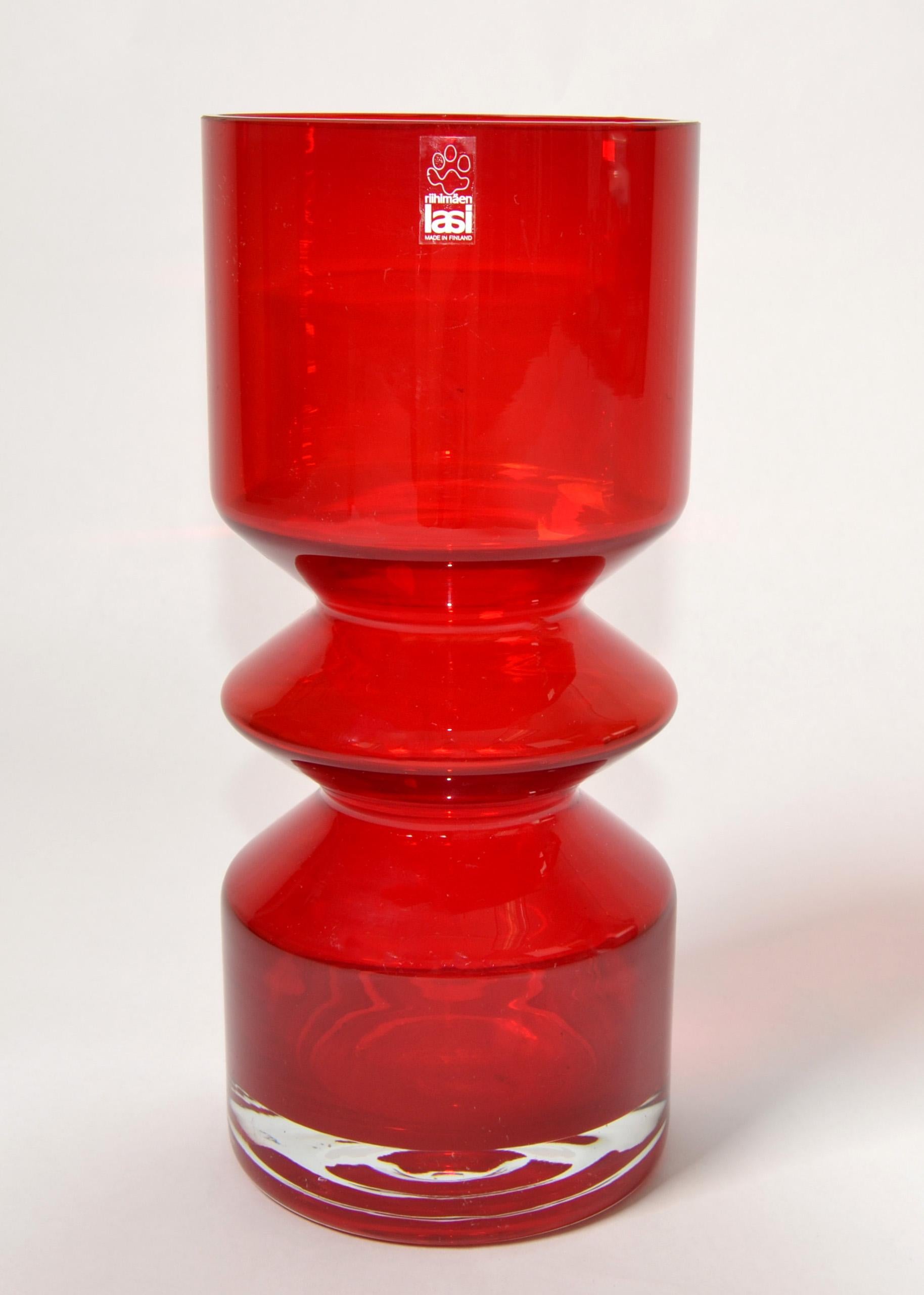 1960s Scandinavian Modern Tamara Aladin Red Blown Art Glass Vase for Riihimaen Lasi Oy Finland.
In good vintage condition with minor wear.
Makers Mark Foil Label at the Top of the Vase.
A decorative Vase for the Holiday Table Setting or a great Gift