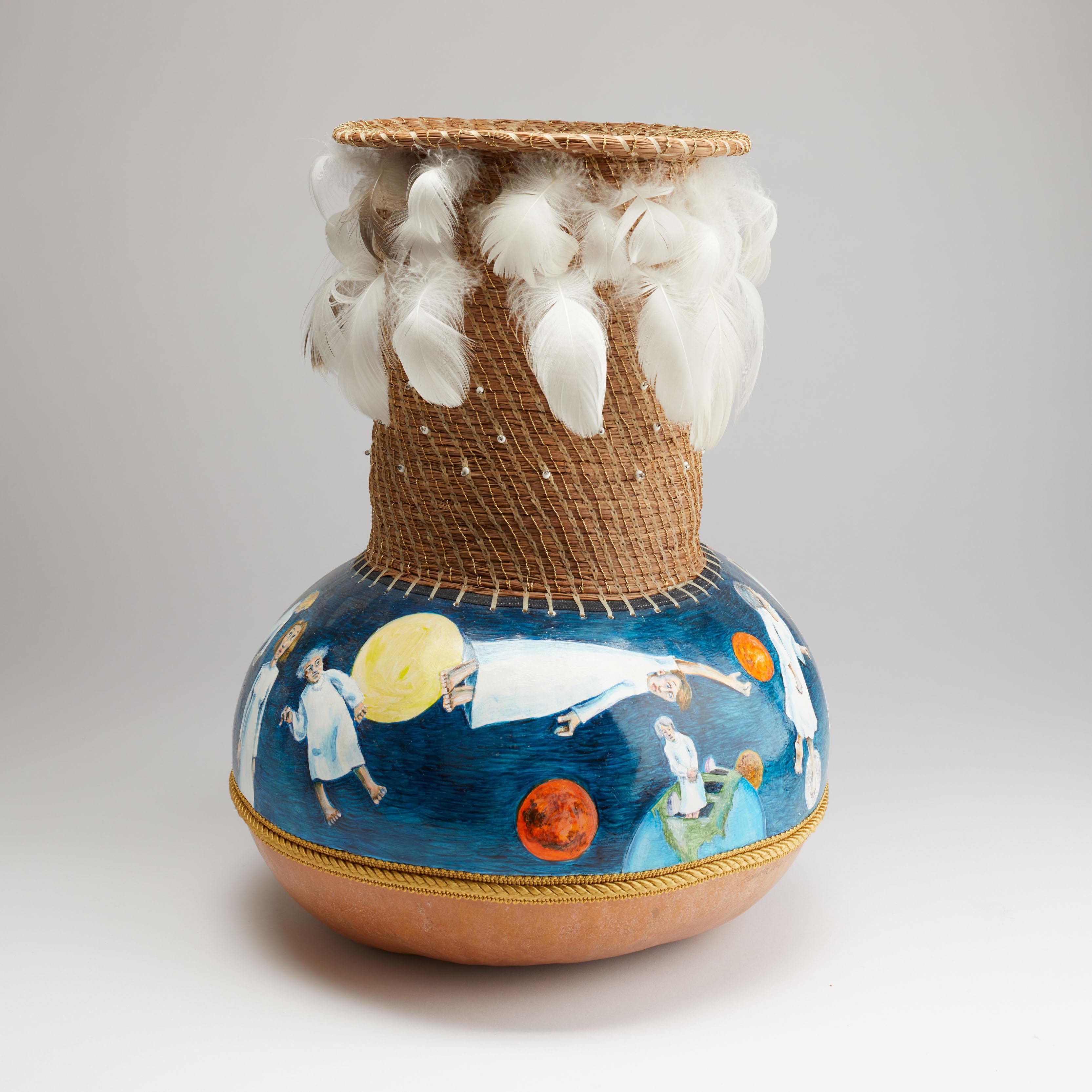 Gourd pot sculpture made of traditional materials of pine needles with beeswax sealant, gourd lined with pine sap, oil paint on applied primed canvas, cotton cloth, feathers, loom beading.