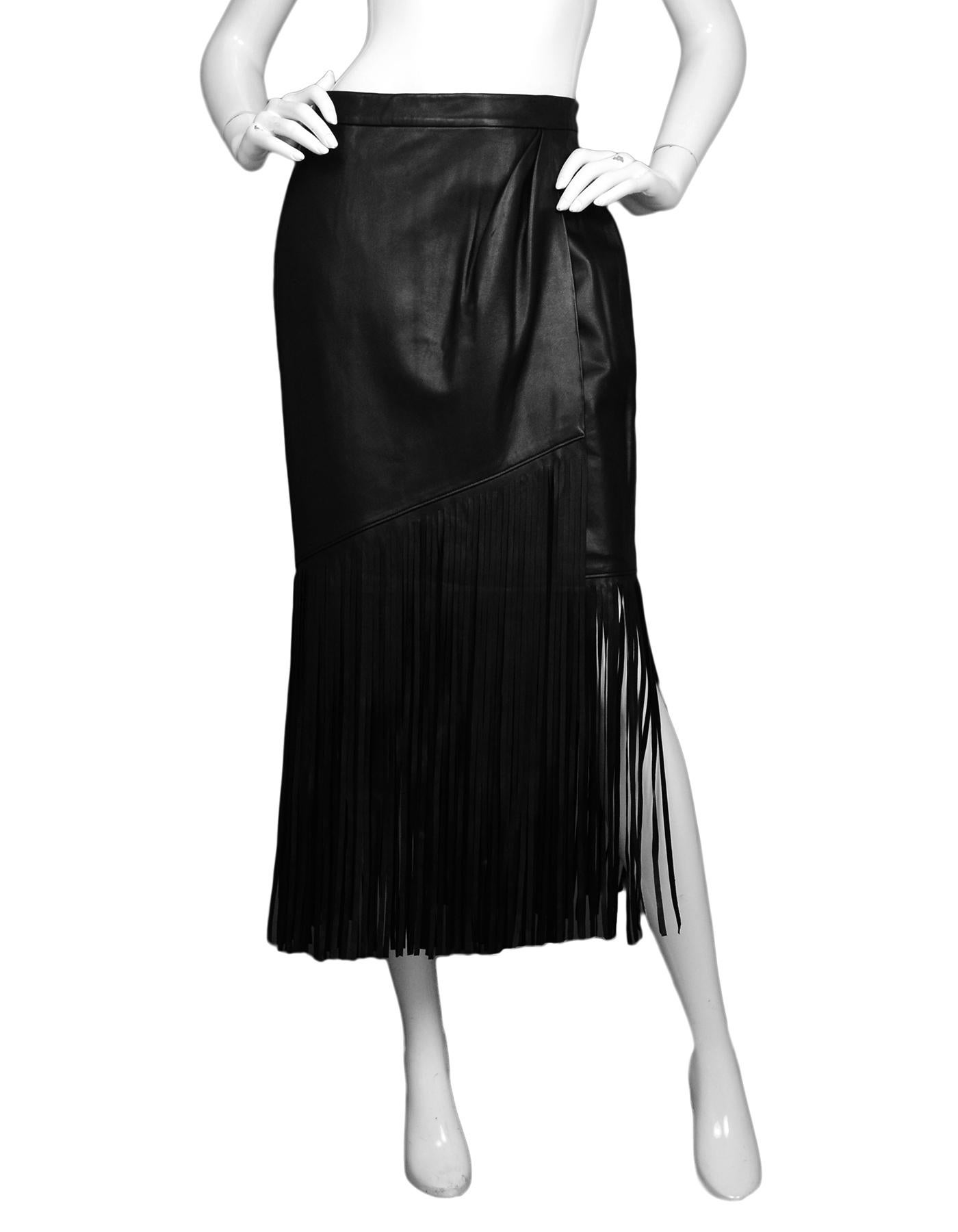 Tamara Mellon Black Leather Fringe Skirt NWT Sz 10

Made In:  China 
Color: Black
Materials: 100% real suede
Lining:  100% polyester
Closure/Opening: Hidden back zipper, with double hook and button closure at top
Overall Condition: Excellent