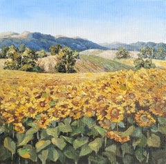 Vallée ensoleillée - Paysage avec champs de tournesols et montagne