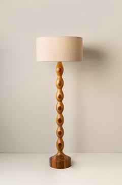 Tamarindo Sculpted Wood Glow Floor Lamp by Isabel Moncada