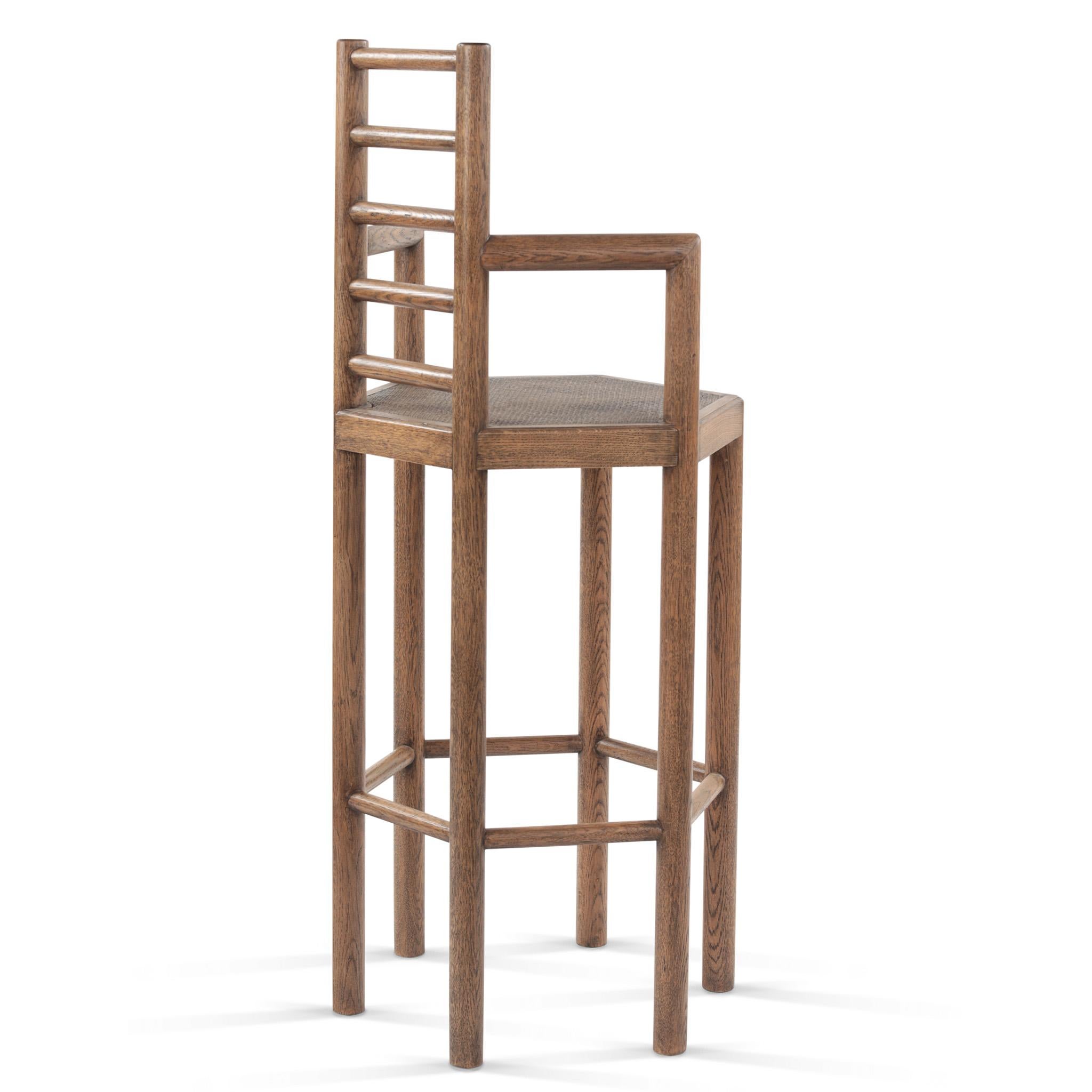 Designed by Josh Greene.
Hexagonal ladder bar stool with caning seat. 

Also available in a counter and side chair height.