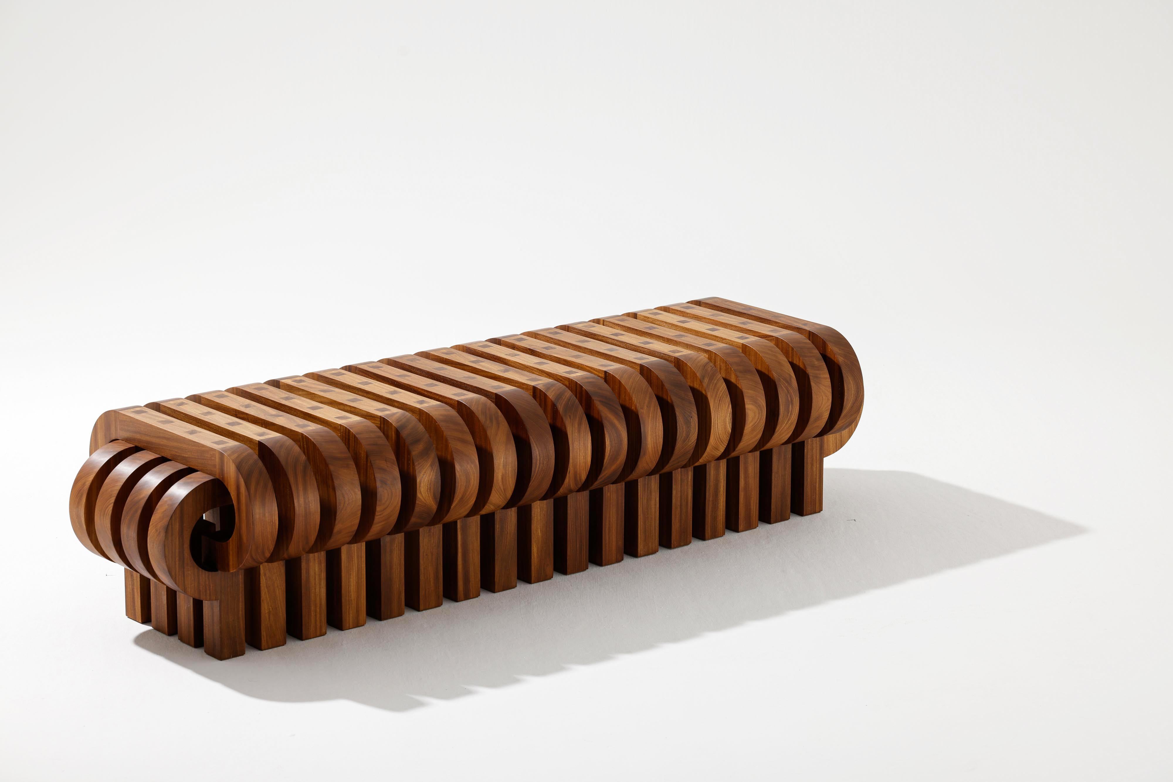 Tamga Afromasia Bench by Tolga Sencer
Dimensions: D 55.5 x W 172.5 x H 40 cm.
Materials: Afromosia wood.

Available in different wood options (massive american walnut, massive wenge, oak, afromosia or black lacquer with stainless steel details).