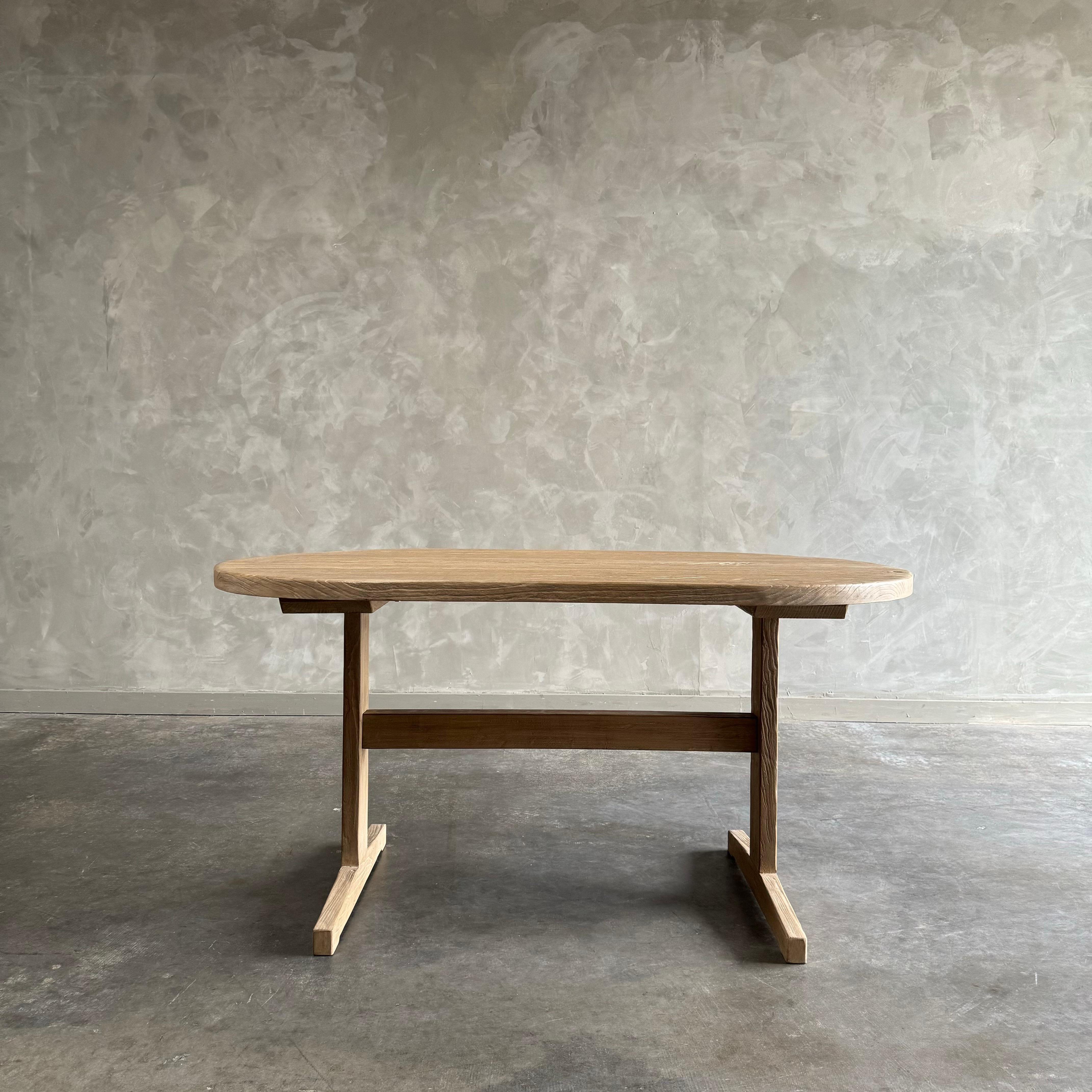 Meticulously hand-crafted in reclaimed elm wood, this dining table is the star of any breakfast, lunch, dinner.  Since this is made from vintage reclaimed materials, there may be some imperfections in the piece or grain of the wood. We like to call