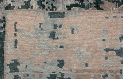 Hellbrauner und grauer Teppich im abstrakten Design