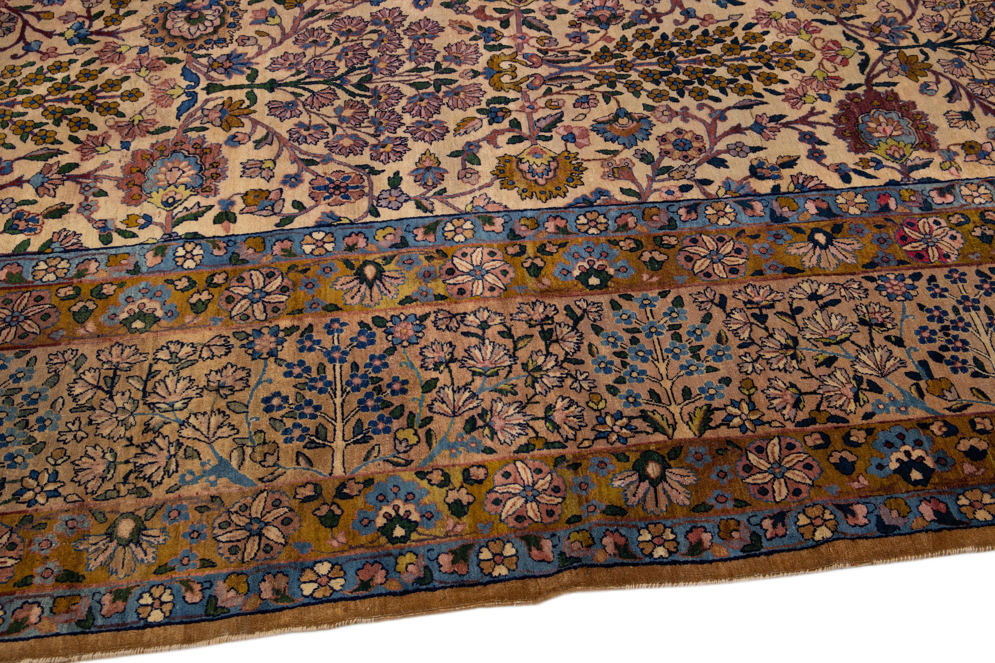 20th Century Tan Antique Kerman Handmade Allover Motif Persian Wool Rug For Sale