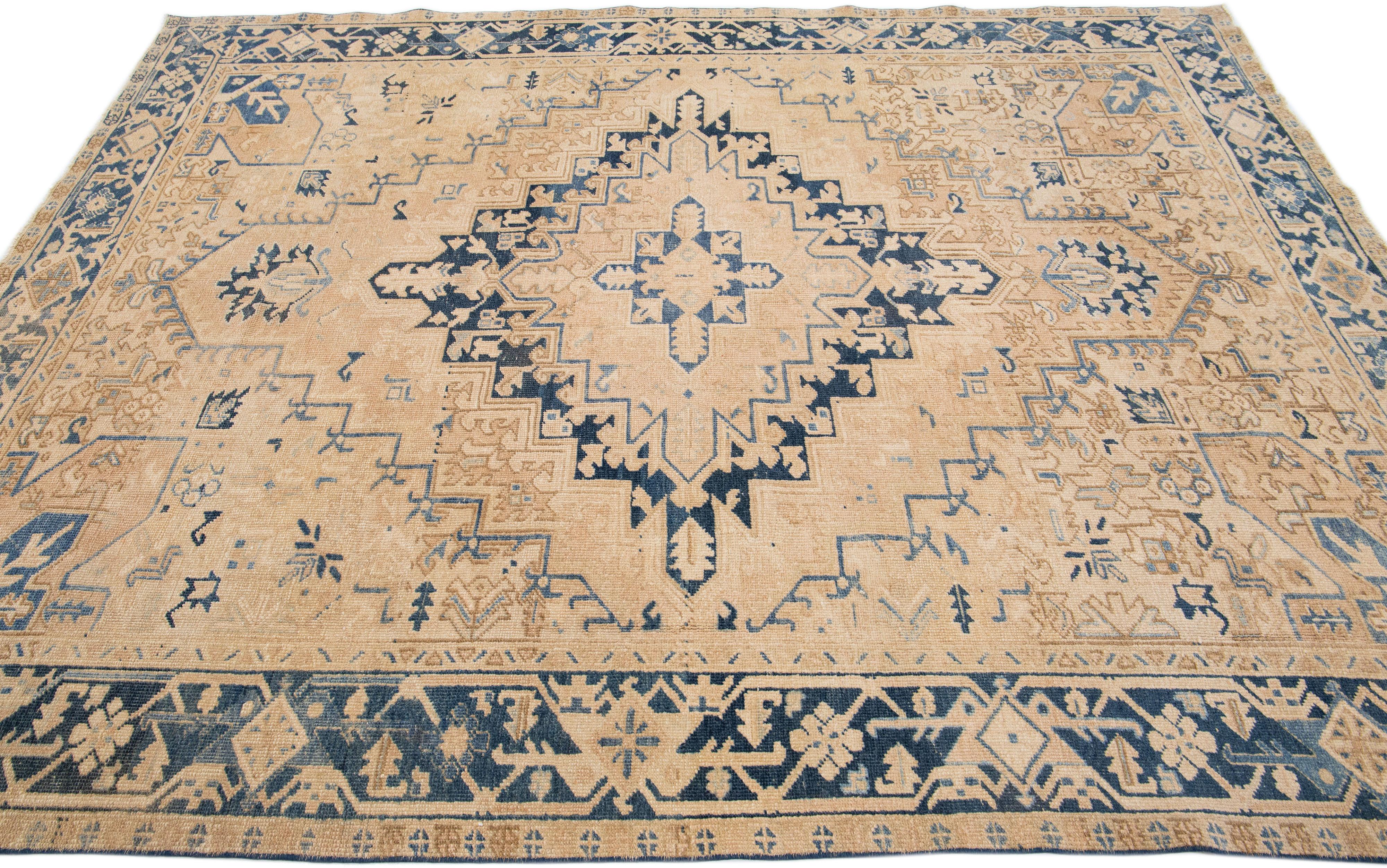 Hand-Knotted Tan Antique Persian Heriz Handmade Wool Rug with Medallion Design For Sale