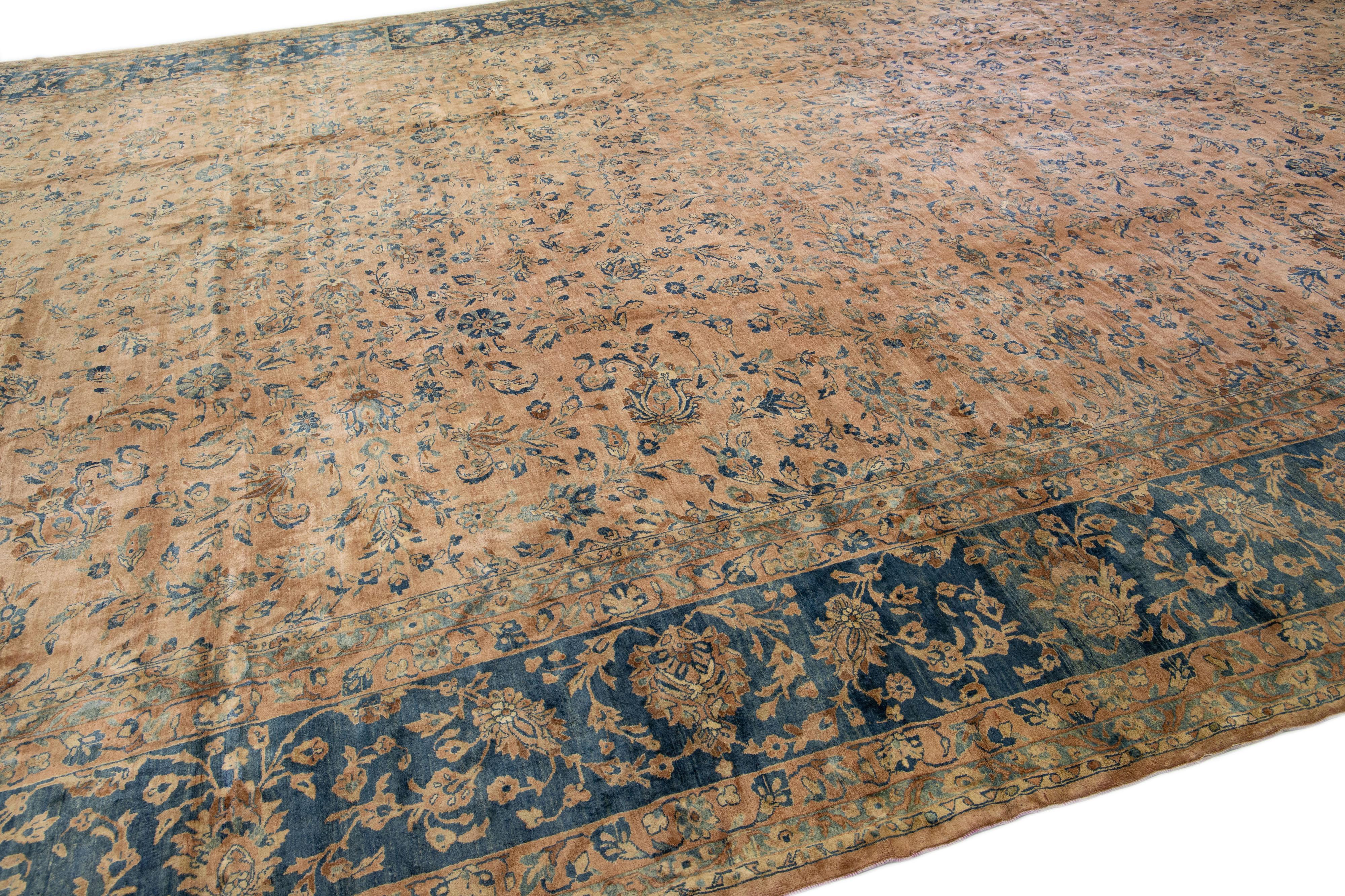 20th Century Tan Antique Tabriz Handmade Oversize Persian Wool Rug with Floral Design For Sale