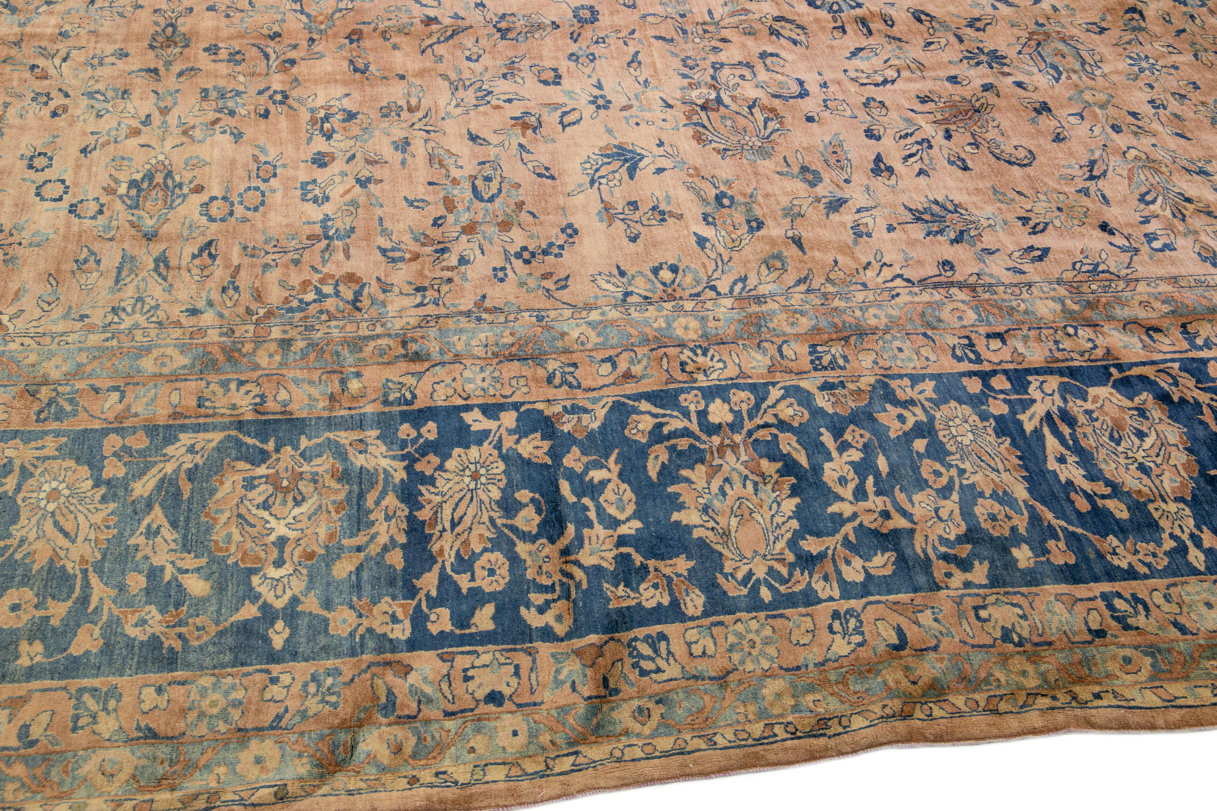 Tan Antique Tabriz Handmade Oversize Persian Wool Rug with Floral Design For Sale 1